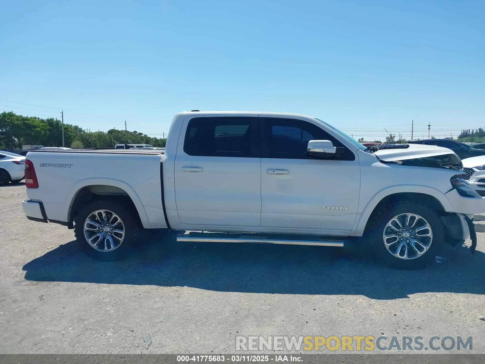 14 Photograph of a damaged car 1C6RREJT6LN188640 RAM 1500 2020