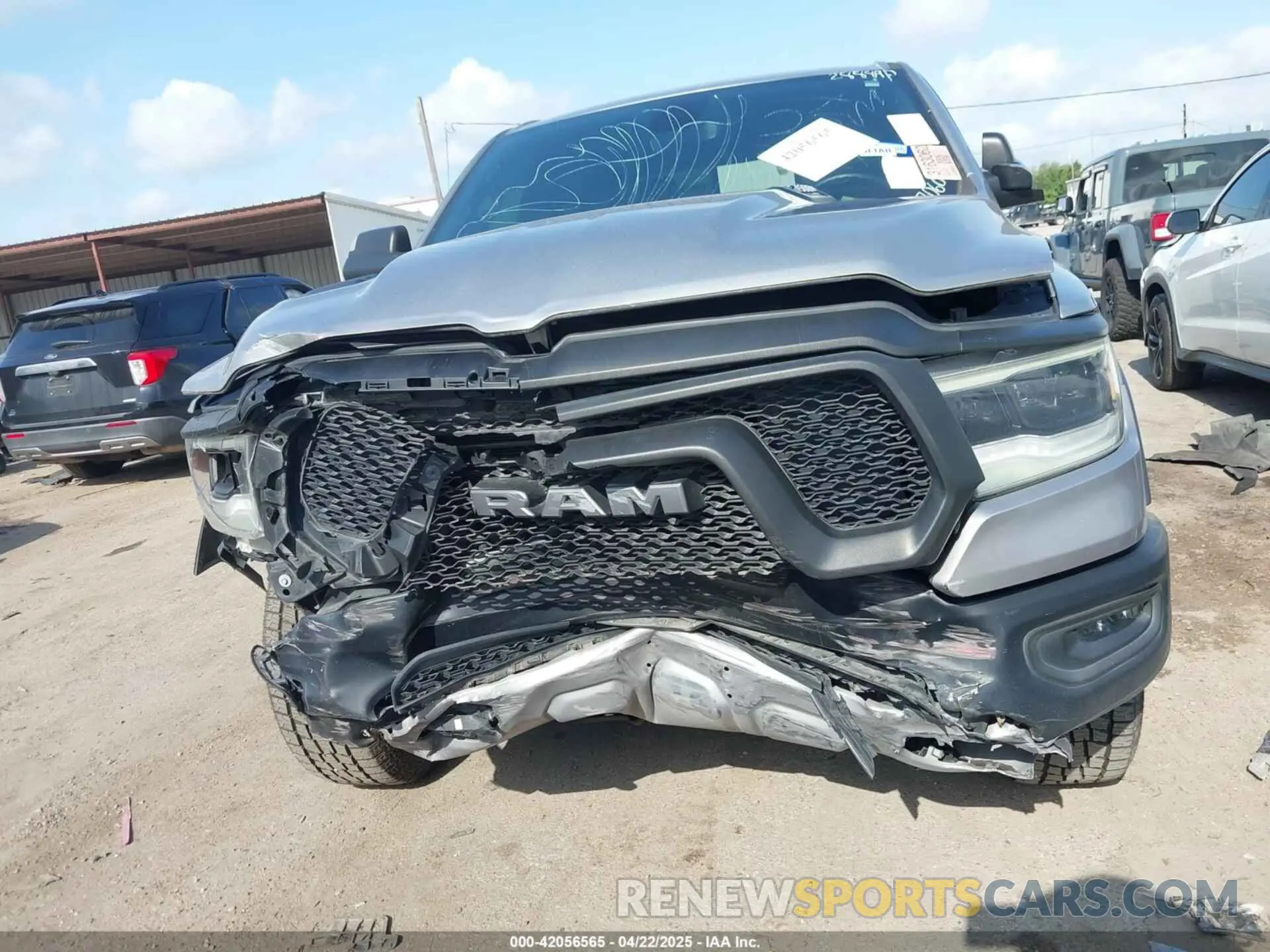 12 Photograph of a damaged car 1C6RRELT4LN267060 RAM 1500 2020