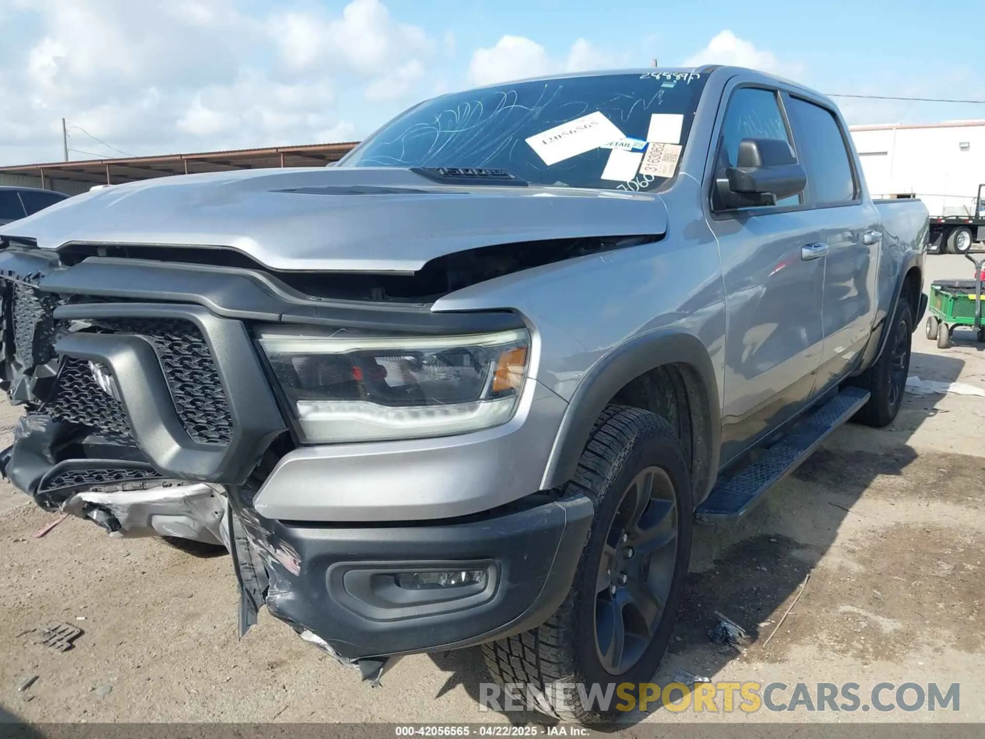 2 Photograph of a damaged car 1C6RRELT4LN267060 RAM 1500 2020