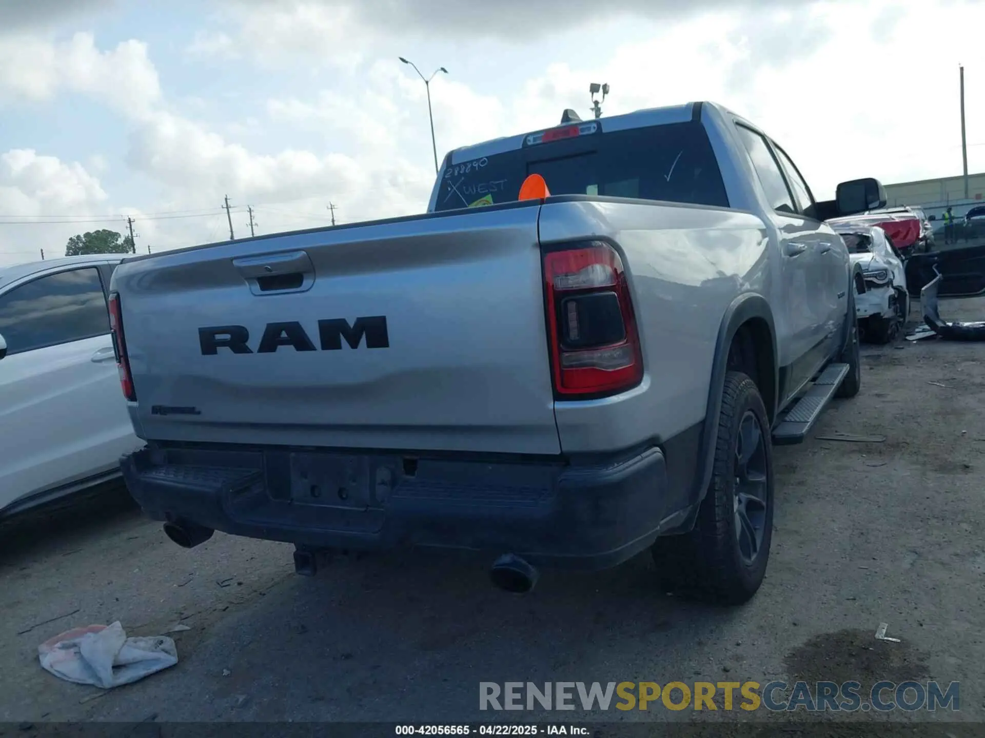 4 Photograph of a damaged car 1C6RRELT4LN267060 RAM 1500 2020