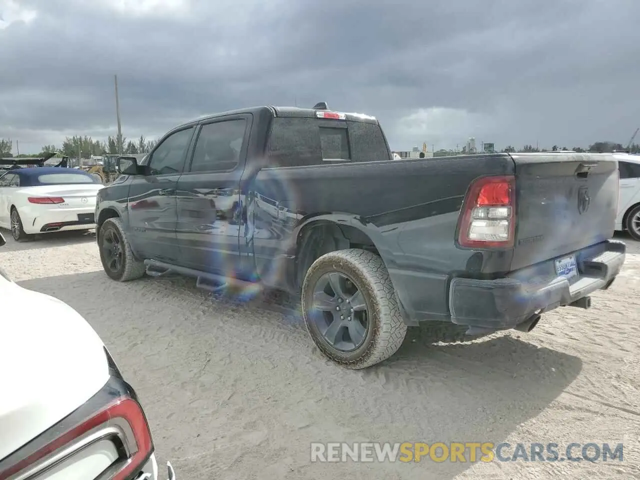 2 Photograph of a damaged car 1C6RREMT4LN357307 RAM 1500 2020