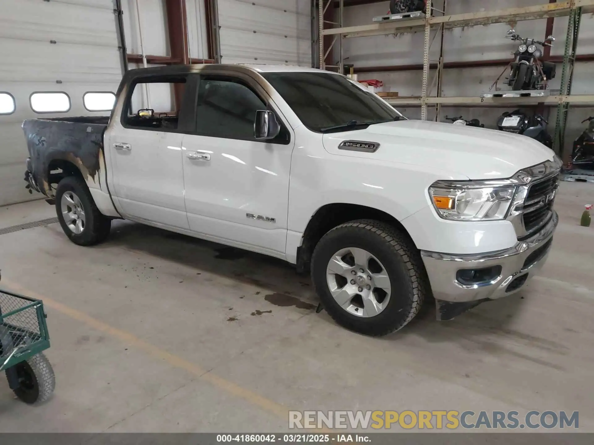1 Photograph of a damaged car 1C6RRFFG2LN286467 RAM 1500 2020