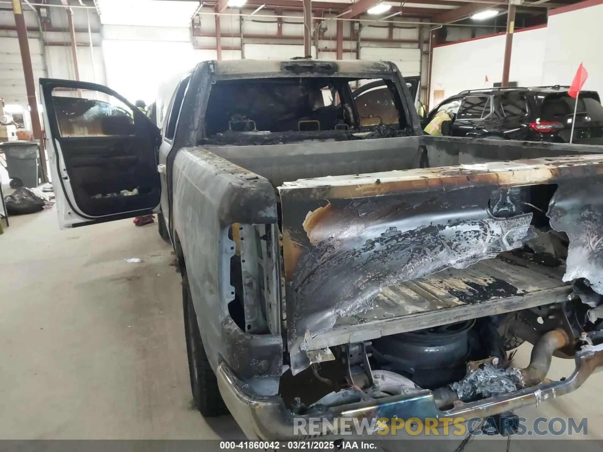 6 Photograph of a damaged car 1C6RRFFG2LN286467 RAM 1500 2020