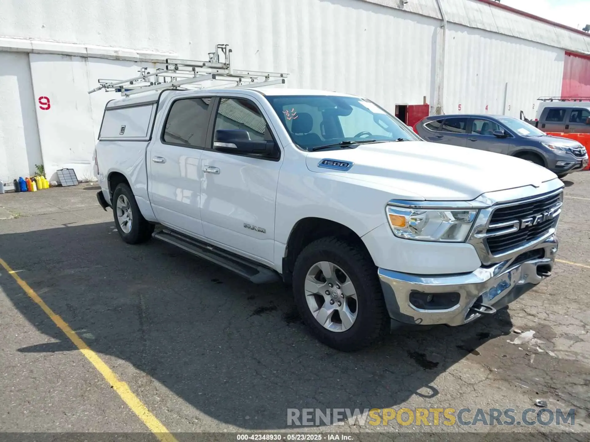1 Photograph of a damaged car 1C6RRFFG7LN263363 RAM 1500 2020