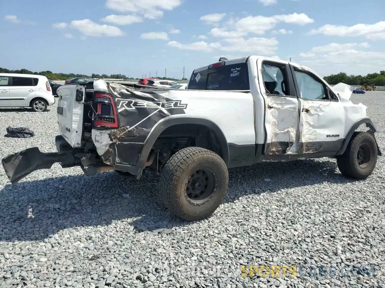 3 Photograph of a damaged car 1C6SRFET9LN258178 RAM 1500 2020