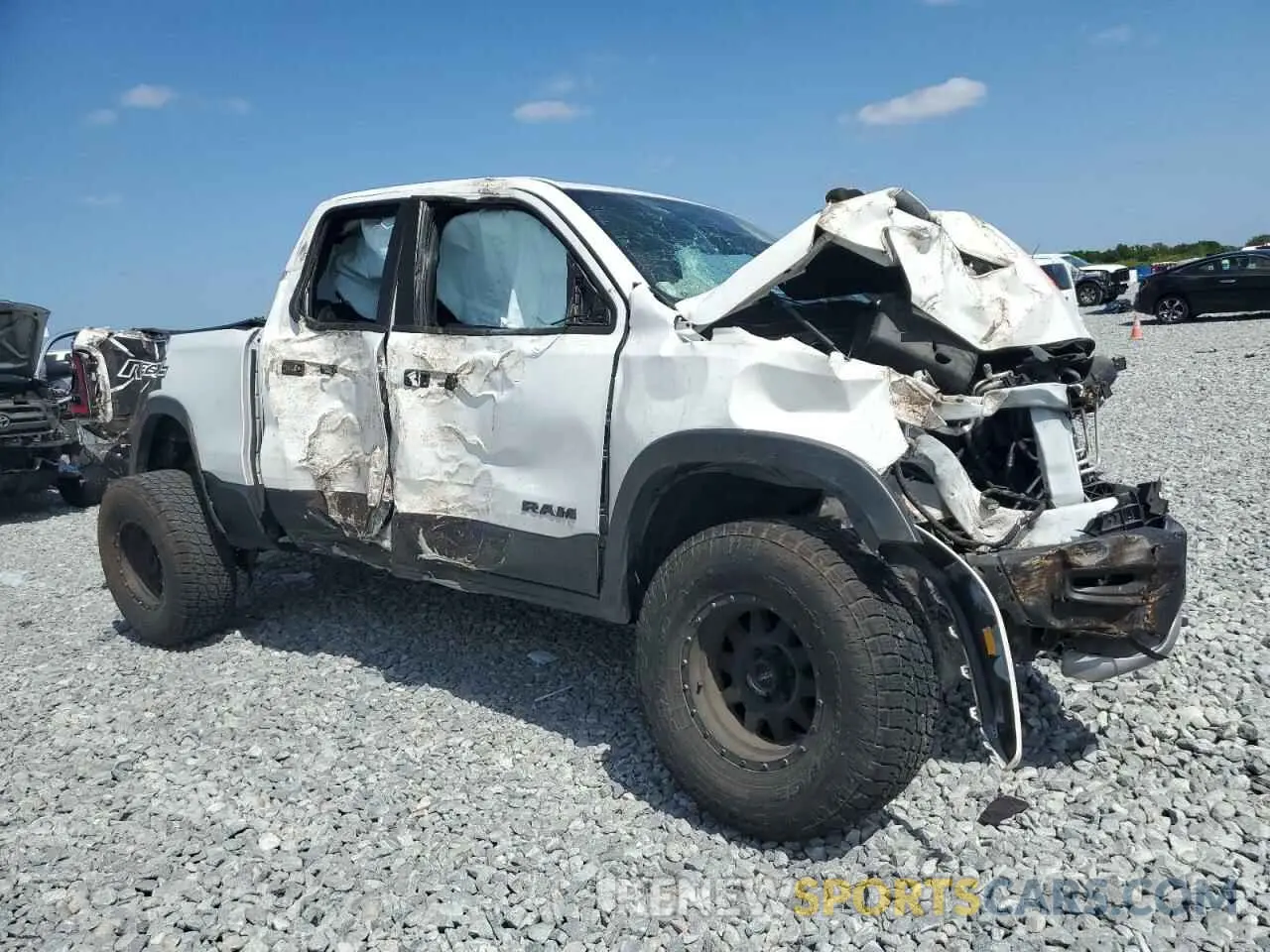 4 Photograph of a damaged car 1C6SRFET9LN258178 RAM 1500 2020