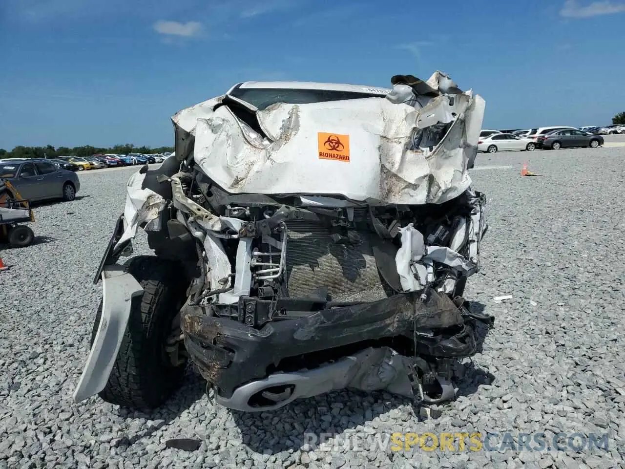 5 Photograph of a damaged car 1C6SRFET9LN258178 RAM 1500 2020