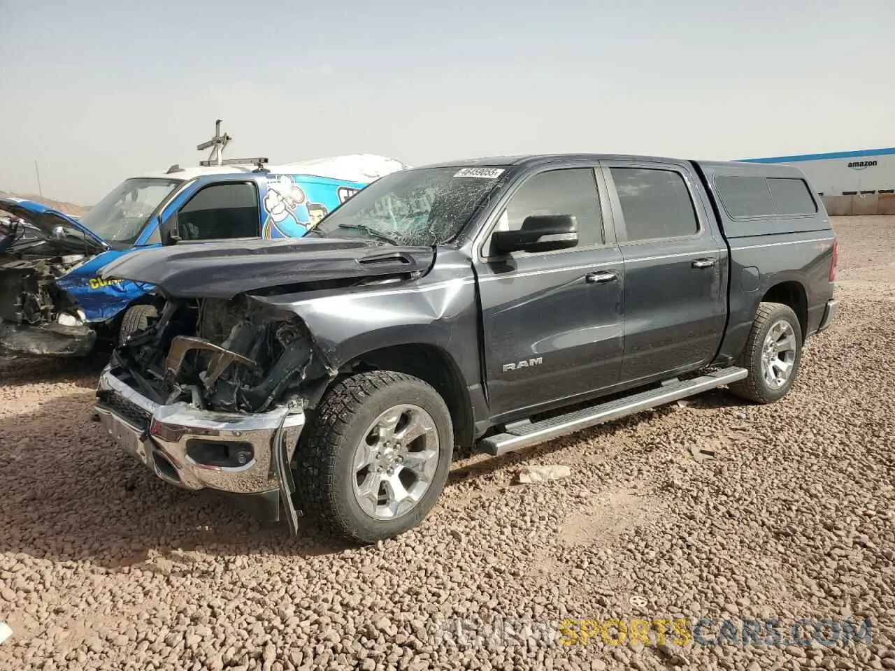 1 Photograph of a damaged car 1C6SRFFM6LN201007 RAM 1500 2020