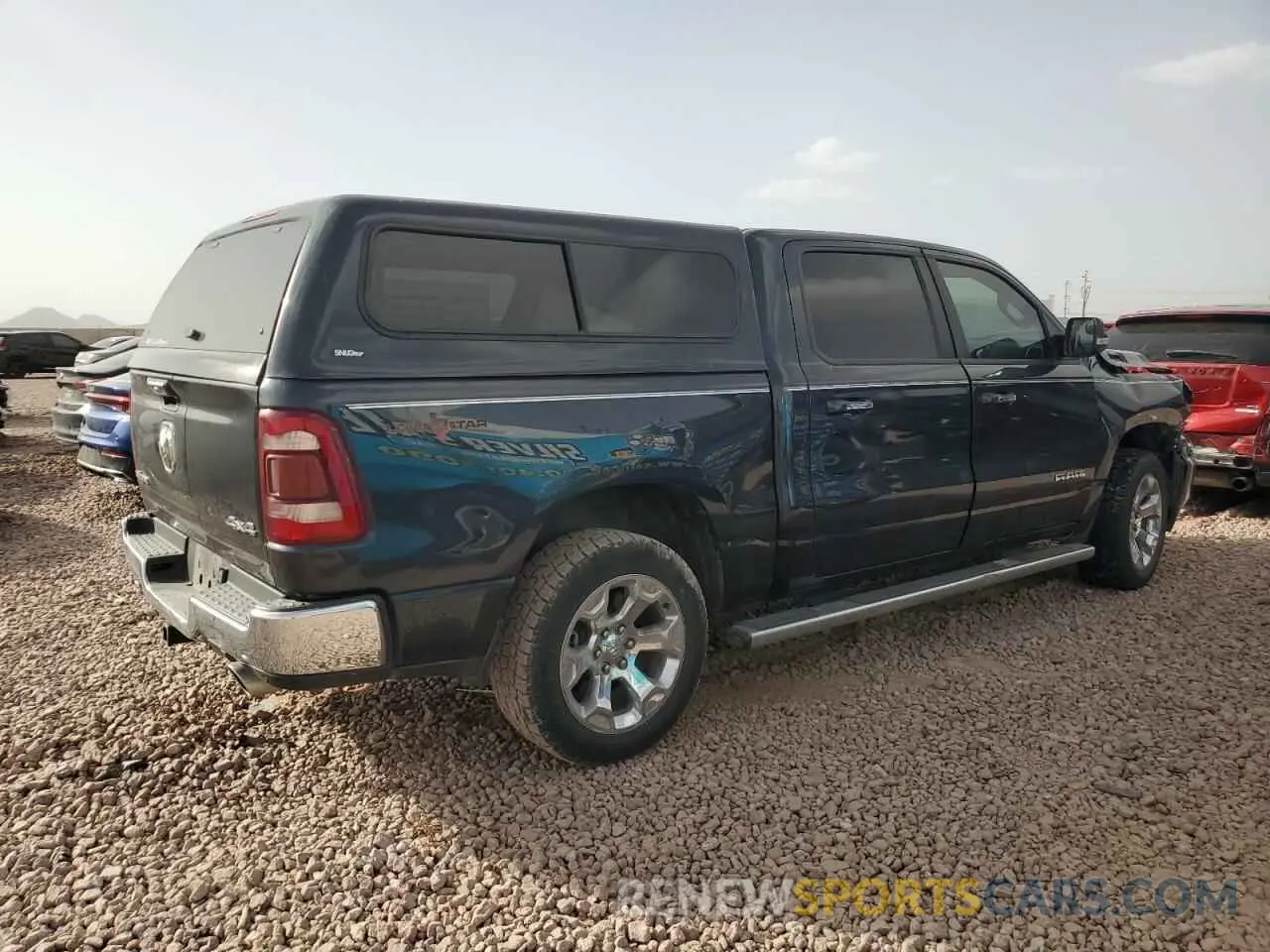 3 Photograph of a damaged car 1C6SRFFM6LN201007 RAM 1500 2020
