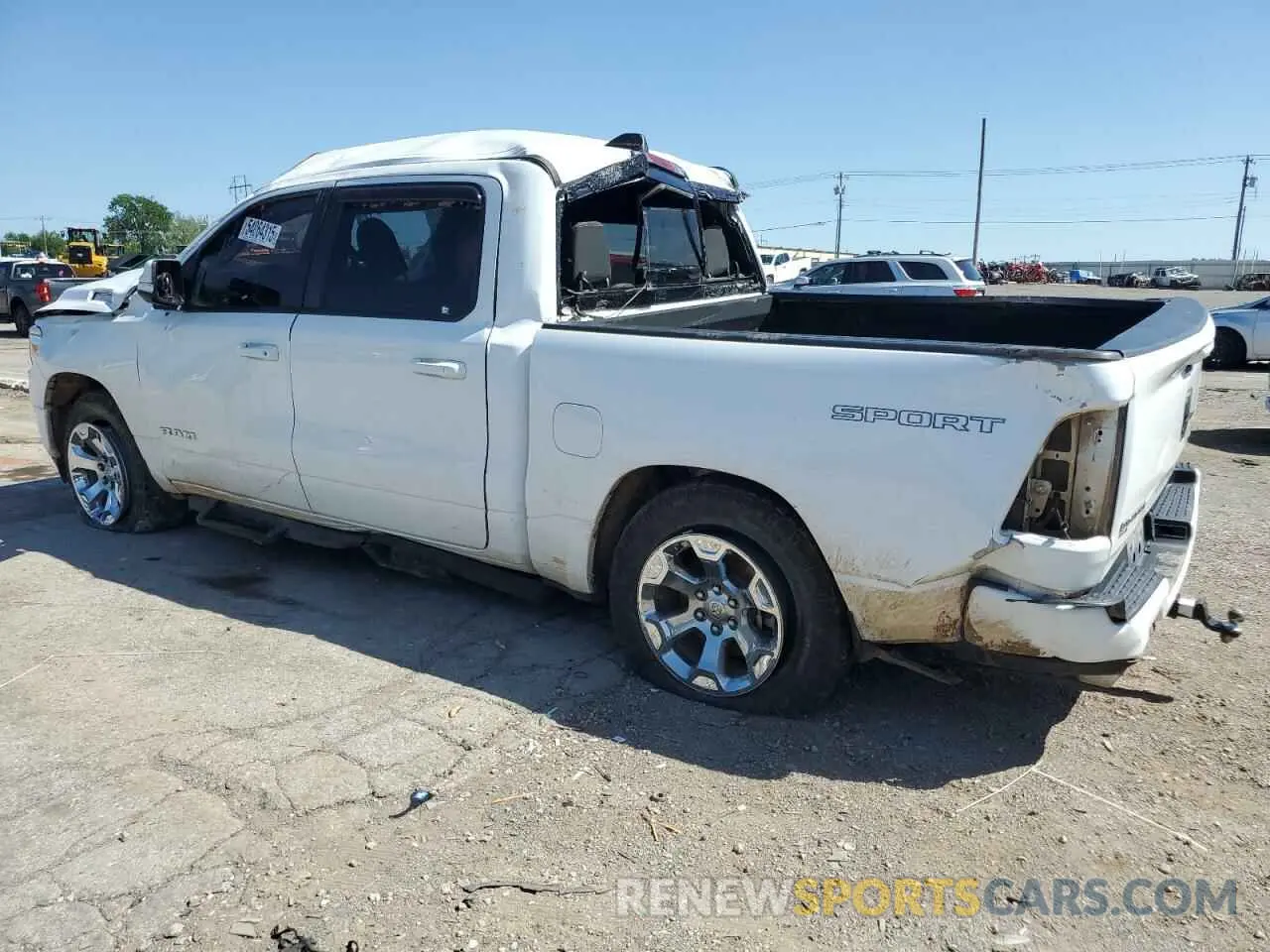 2 Photograph of a damaged car 1C6SRFFT0LN110077 RAM 1500 2020