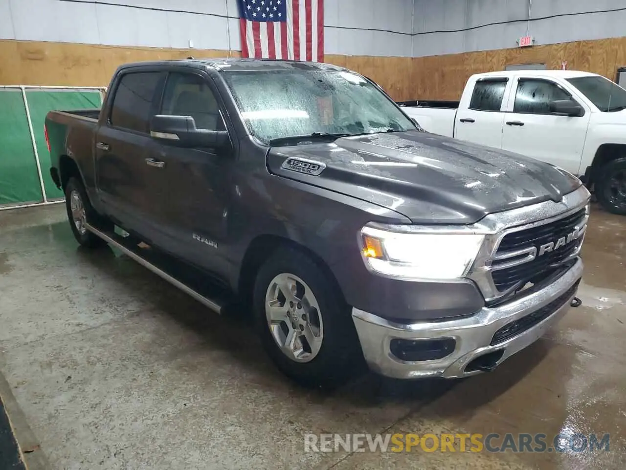4 Photograph of a damaged car 1C6SRFFT0LN113481 RAM 1500 2020