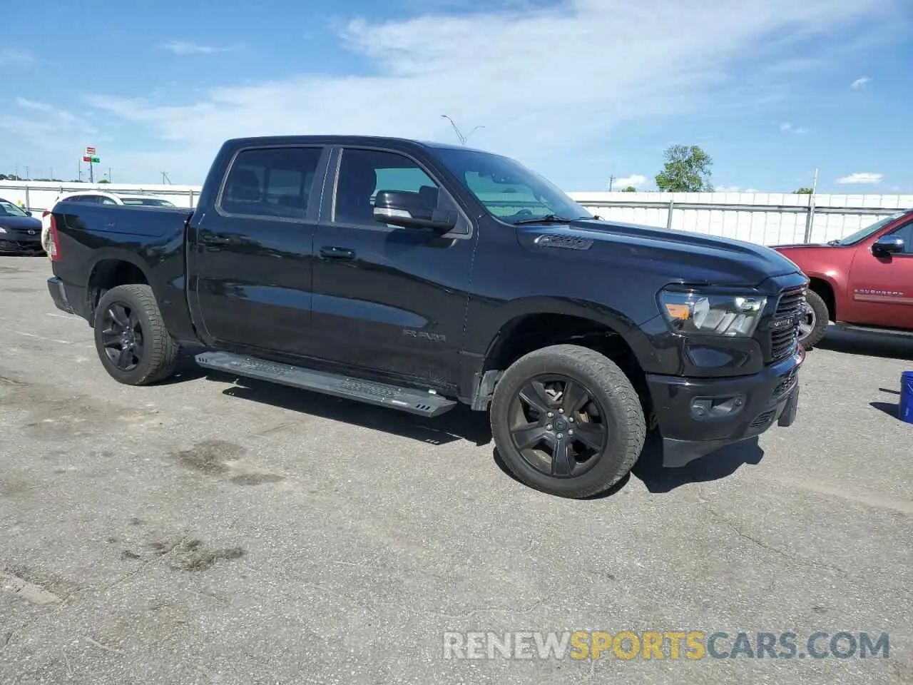 4 Photograph of a damaged car 1C6SRFFT0LN130510 RAM 1500 2020