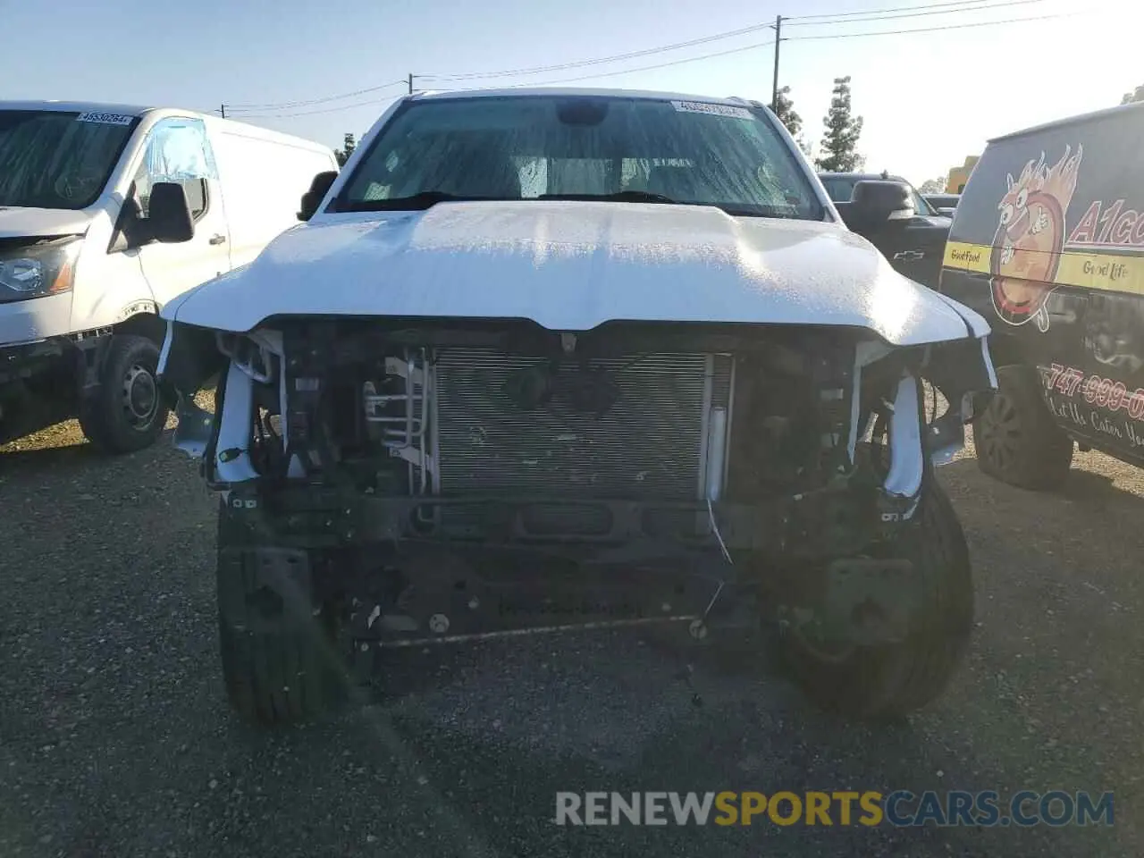 5 Photograph of a damaged car 1C6SRFFT1LN403678 RAM 1500 2020