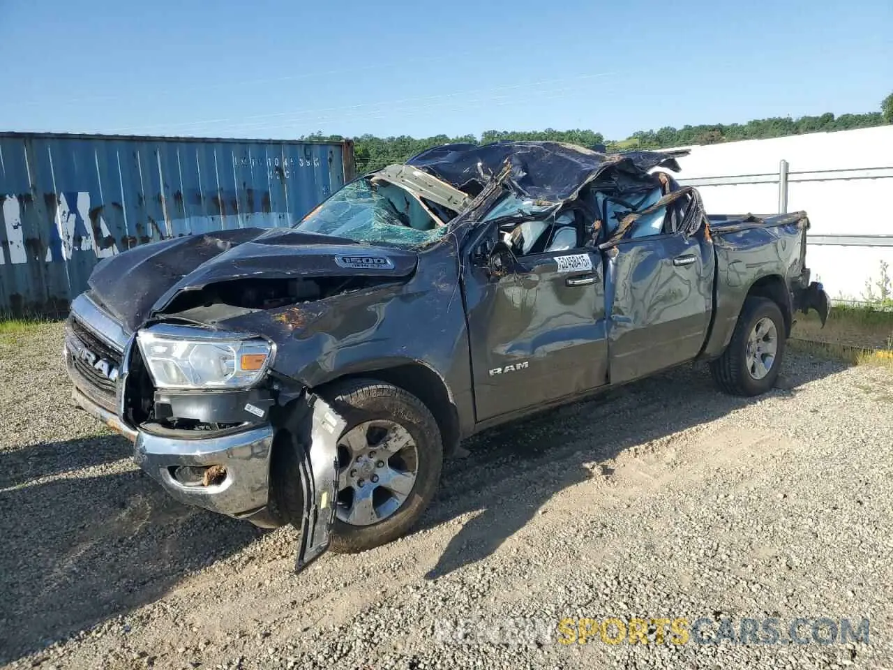 1 Photograph of a damaged car 1C6SRFFT1LN409089 RAM 1500 2020