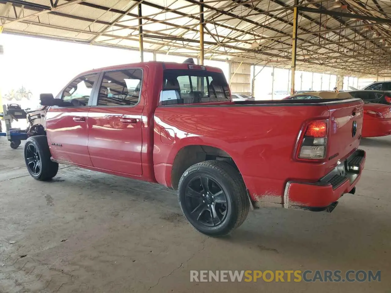 2 Photograph of a damaged car 1C6SRFFT1LN409819 RAM 1500 2020