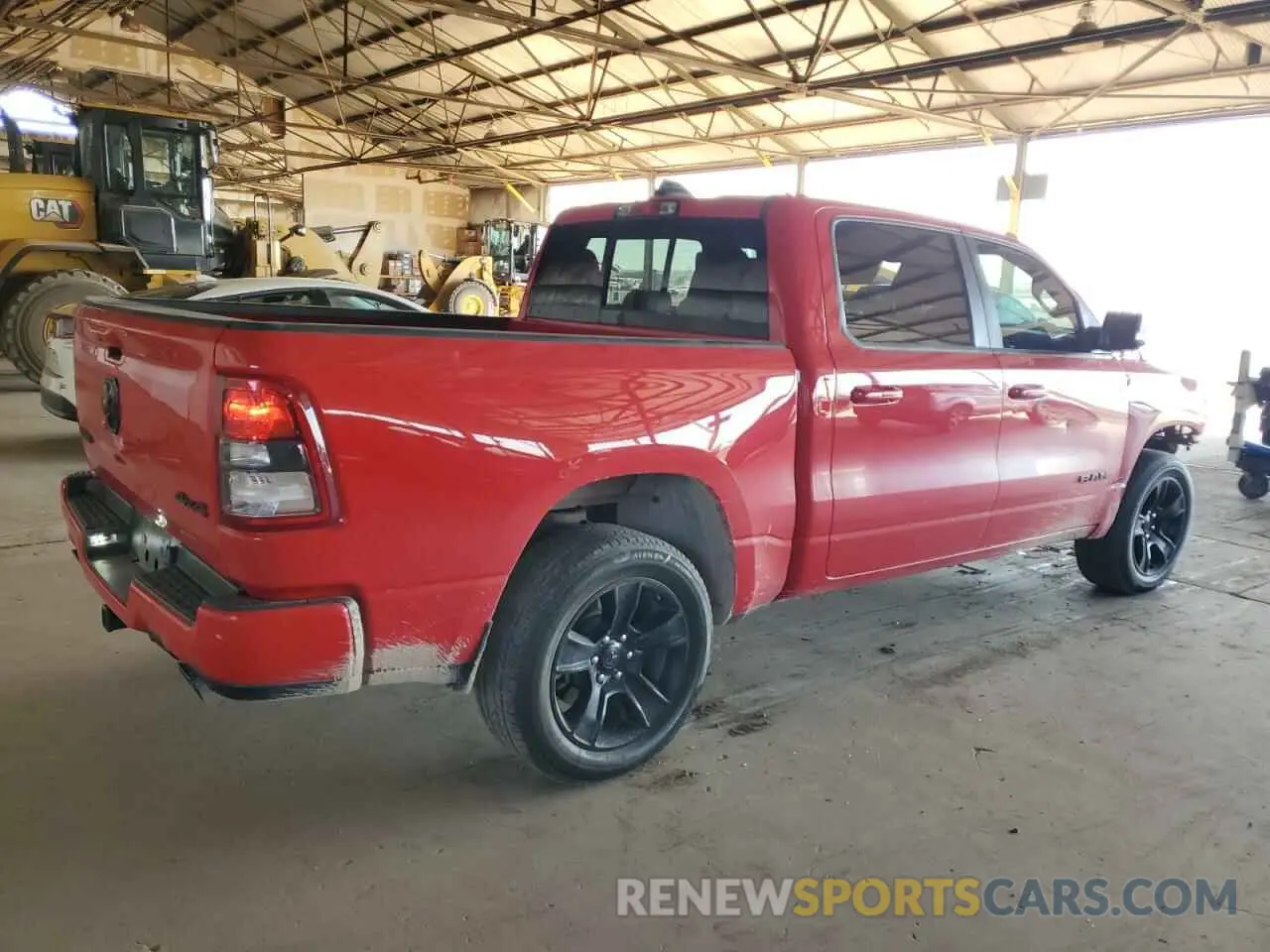 3 Photograph of a damaged car 1C6SRFFT1LN409819 RAM 1500 2020