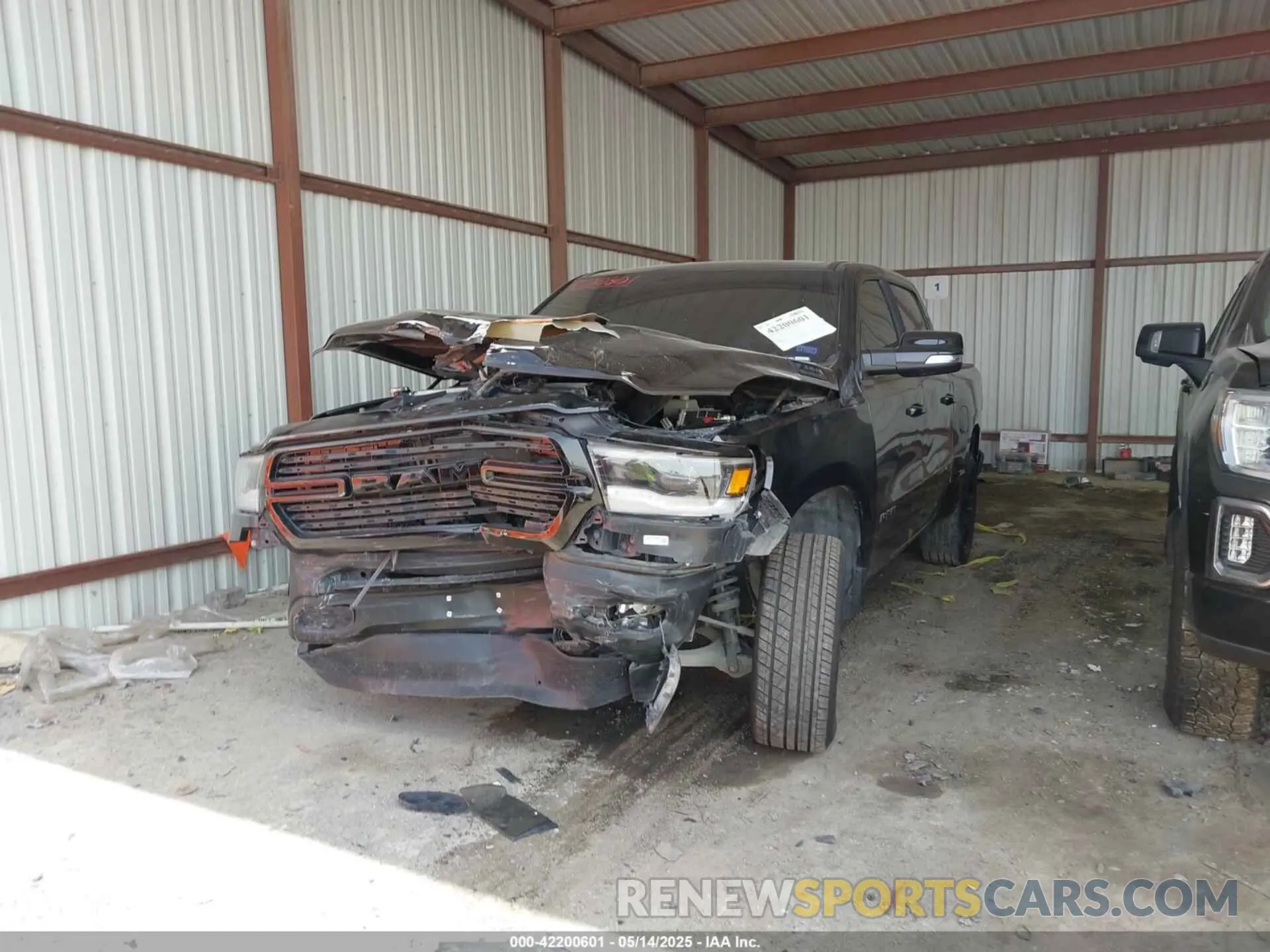 2 Photograph of a damaged car 1C6SRFFT2LN206860 RAM 1500 2020