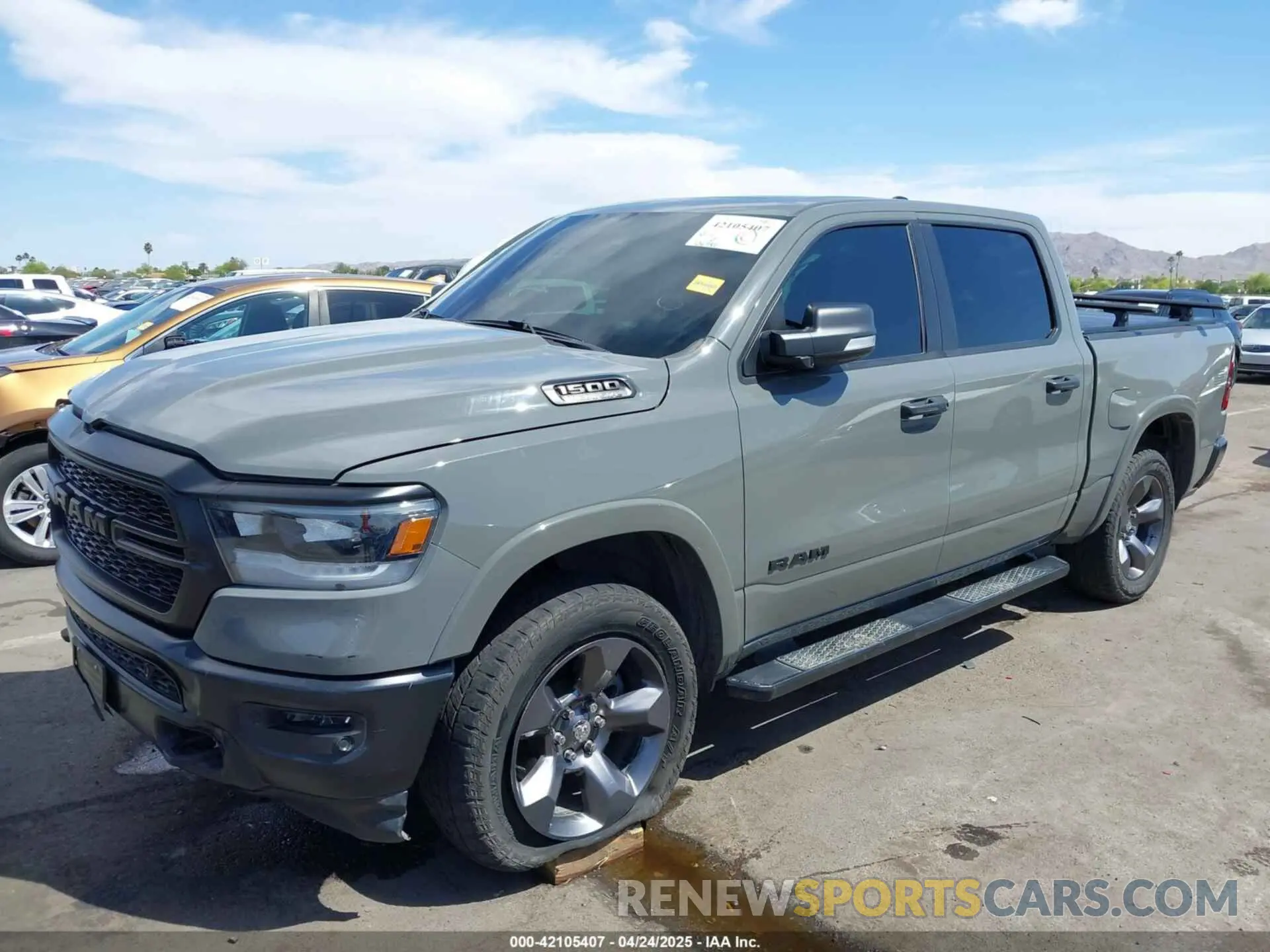 2 Photograph of a damaged car 1C6SRFFT2LN382730 RAM 1500 2020