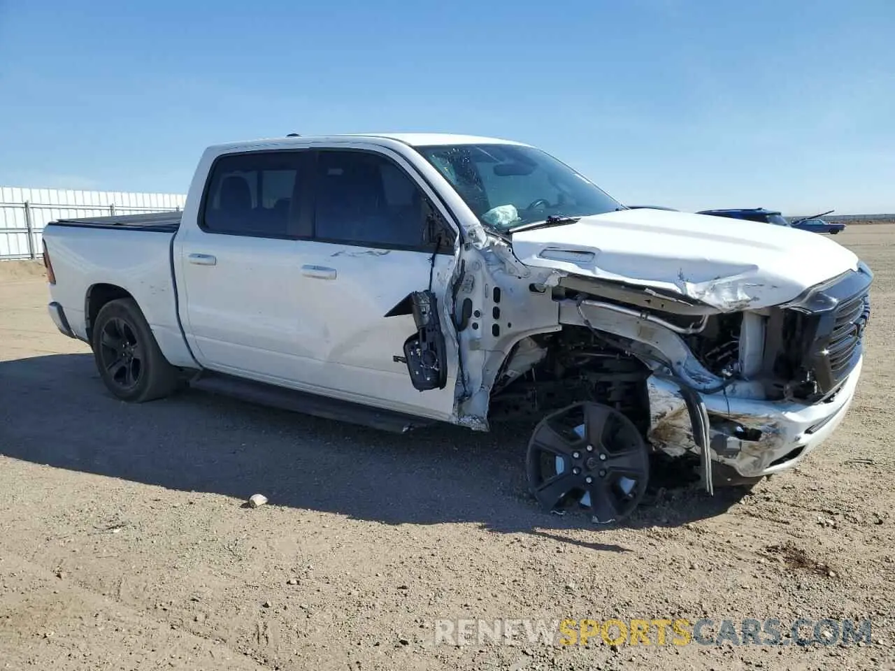 4 Photograph of a damaged car 1C6SRFFT2LN394506 RAM 1500 2020