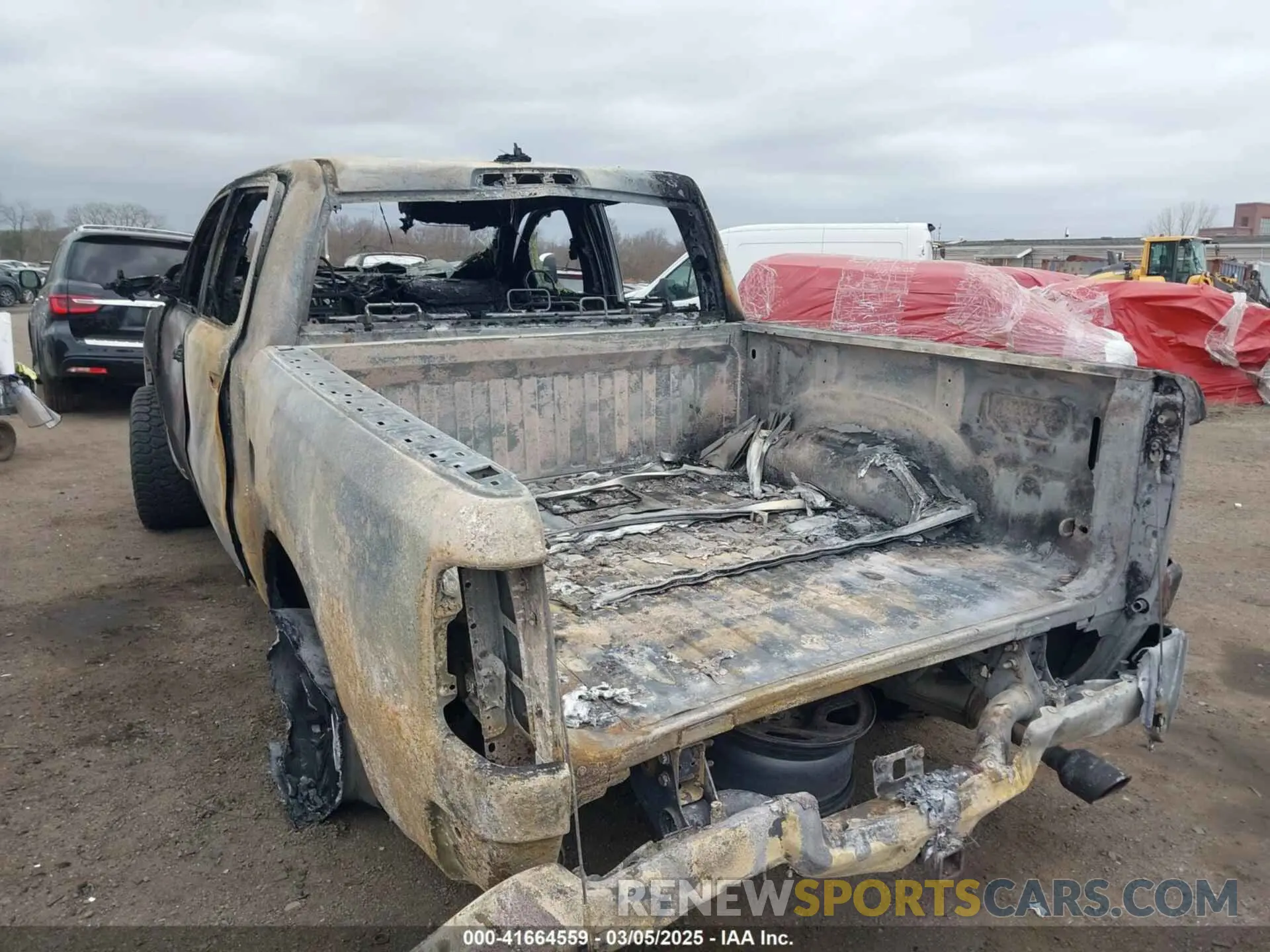 6 Photograph of a damaged car 1C6SRFFT3LN304070 RAM 1500 2020