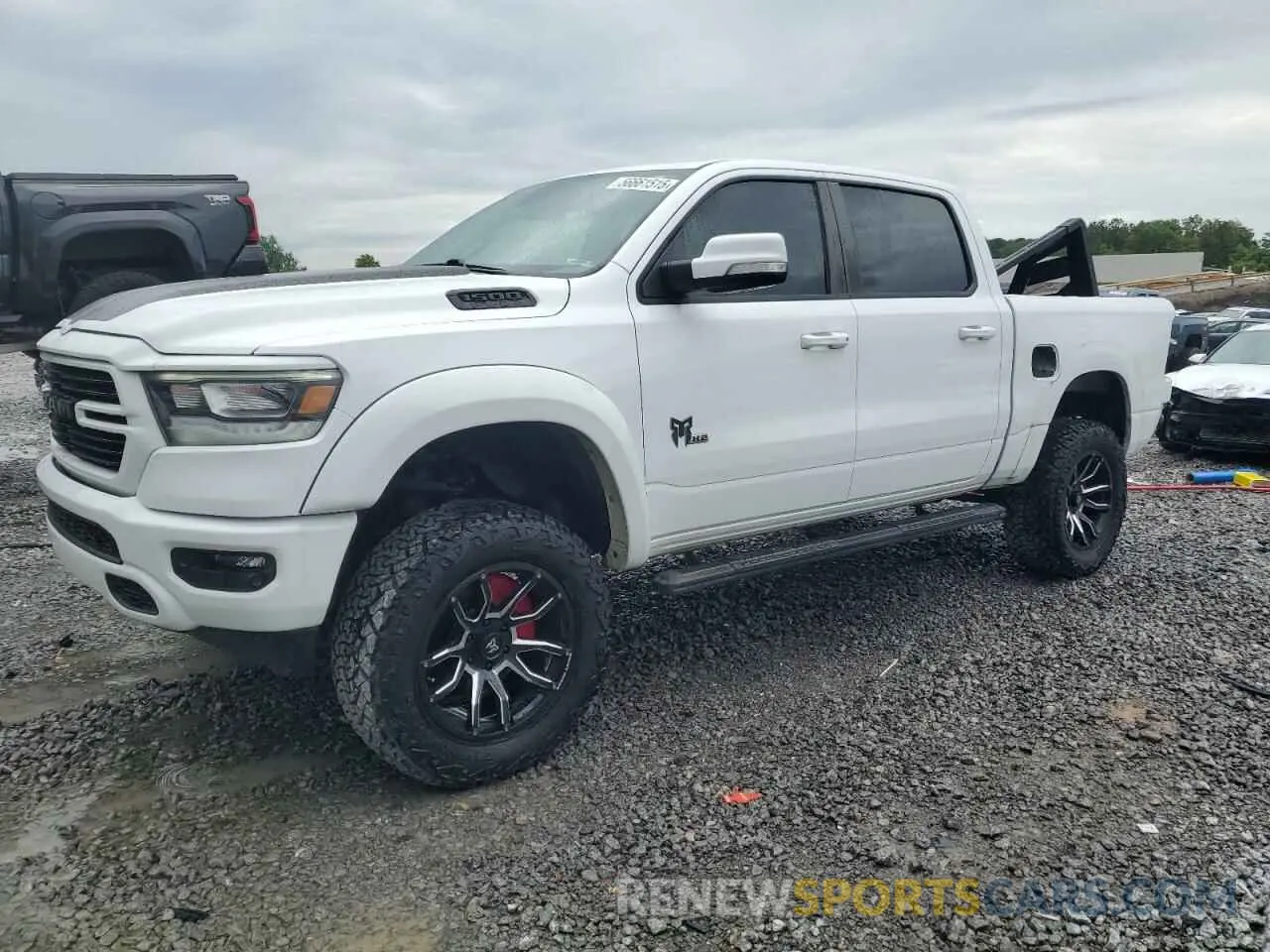 1 Photograph of a damaged car 1C6SRFFT3LN389461 RAM 1500 2020