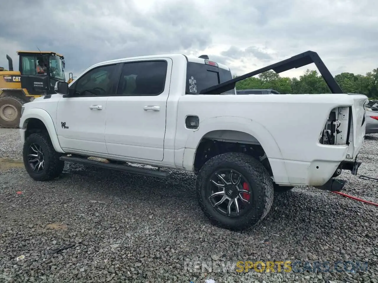 2 Photograph of a damaged car 1C6SRFFT3LN389461 RAM 1500 2020