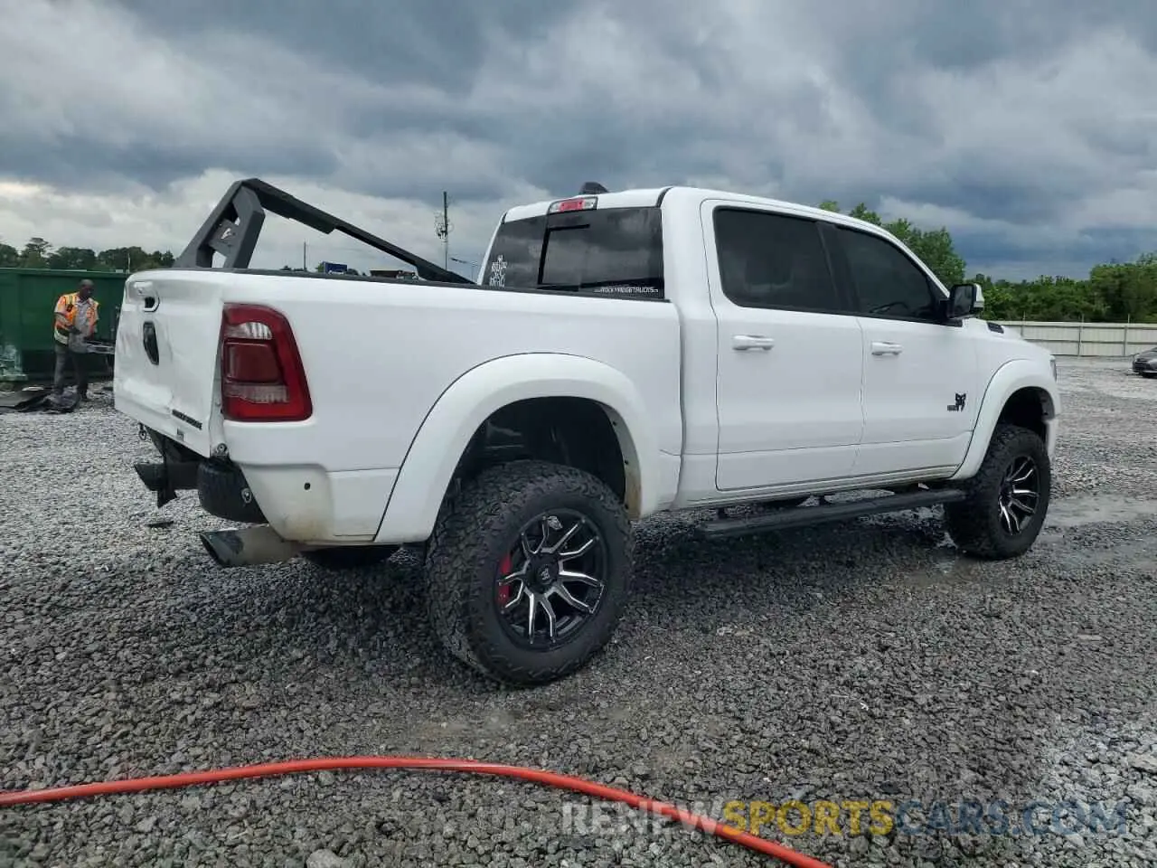 3 Photograph of a damaged car 1C6SRFFT3LN389461 RAM 1500 2020