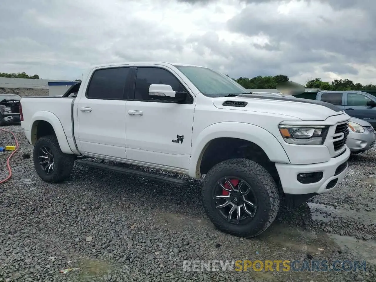 4 Photograph of a damaged car 1C6SRFFT3LN389461 RAM 1500 2020