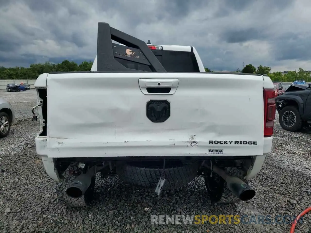 6 Photograph of a damaged car 1C6SRFFT3LN389461 RAM 1500 2020