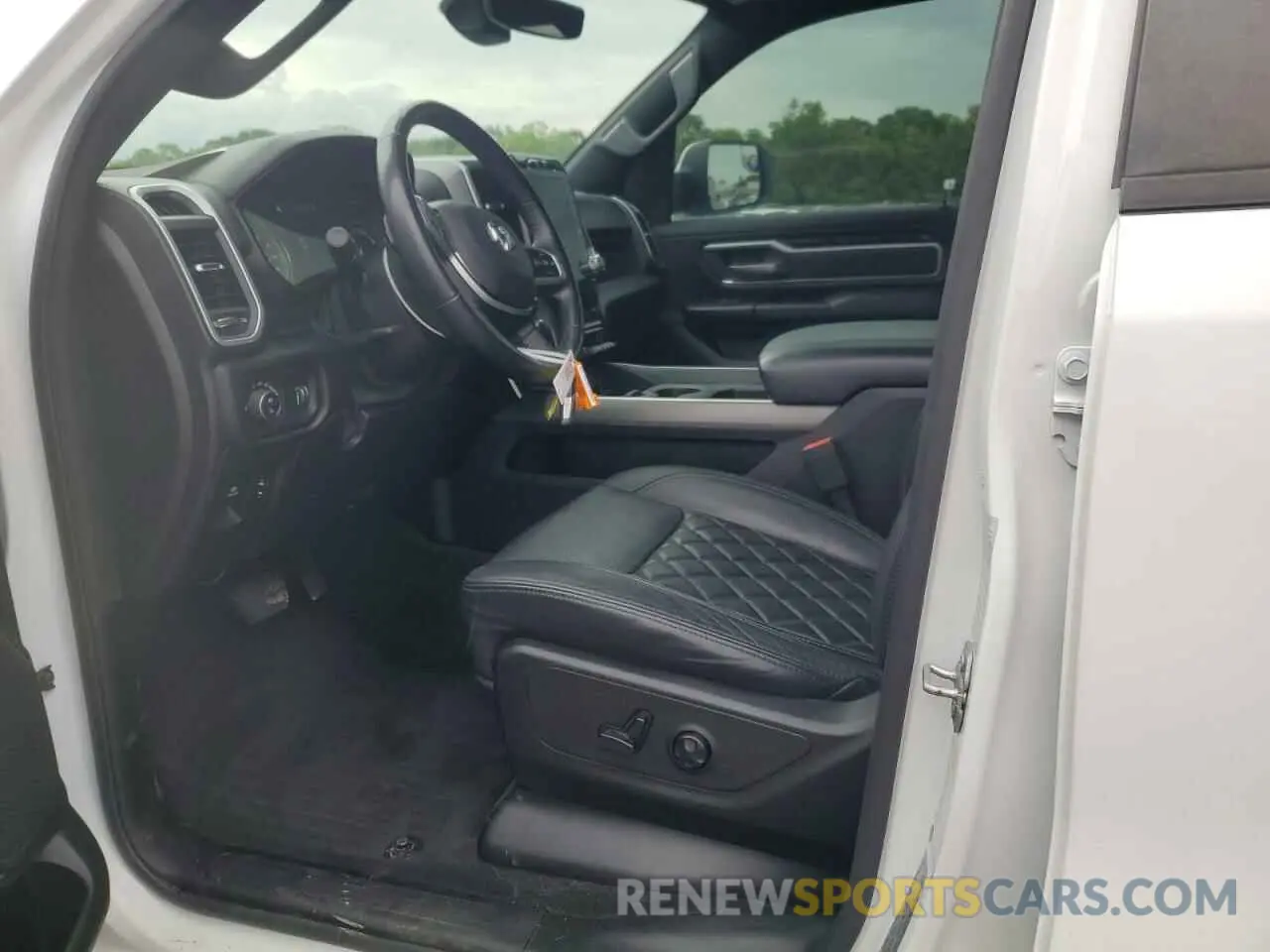 7 Photograph of a damaged car 1C6SRFFT3LN389461 RAM 1500 2020