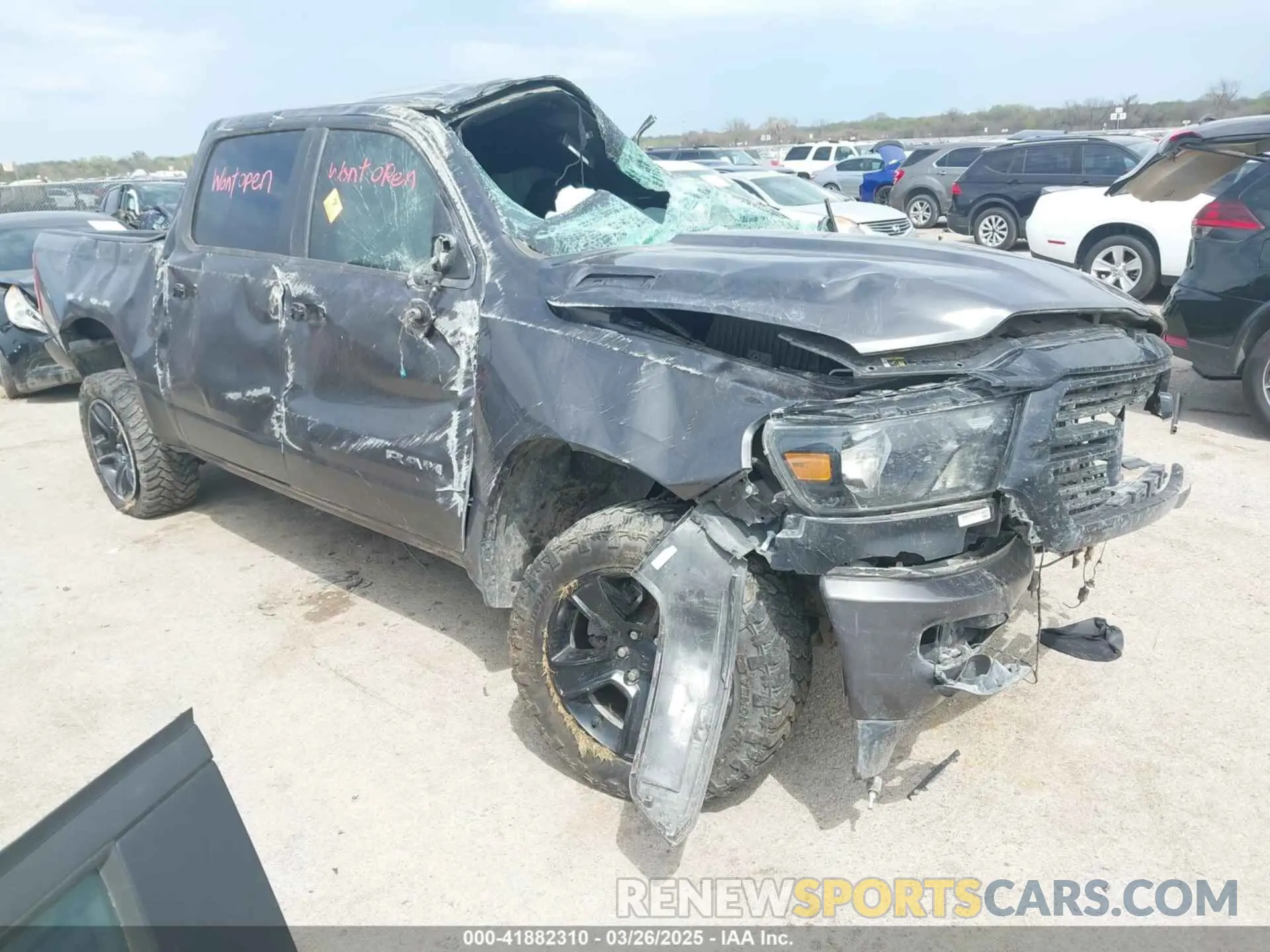 1 Photograph of a damaged car 1C6SRFFT4LN184246 RAM 1500 2020