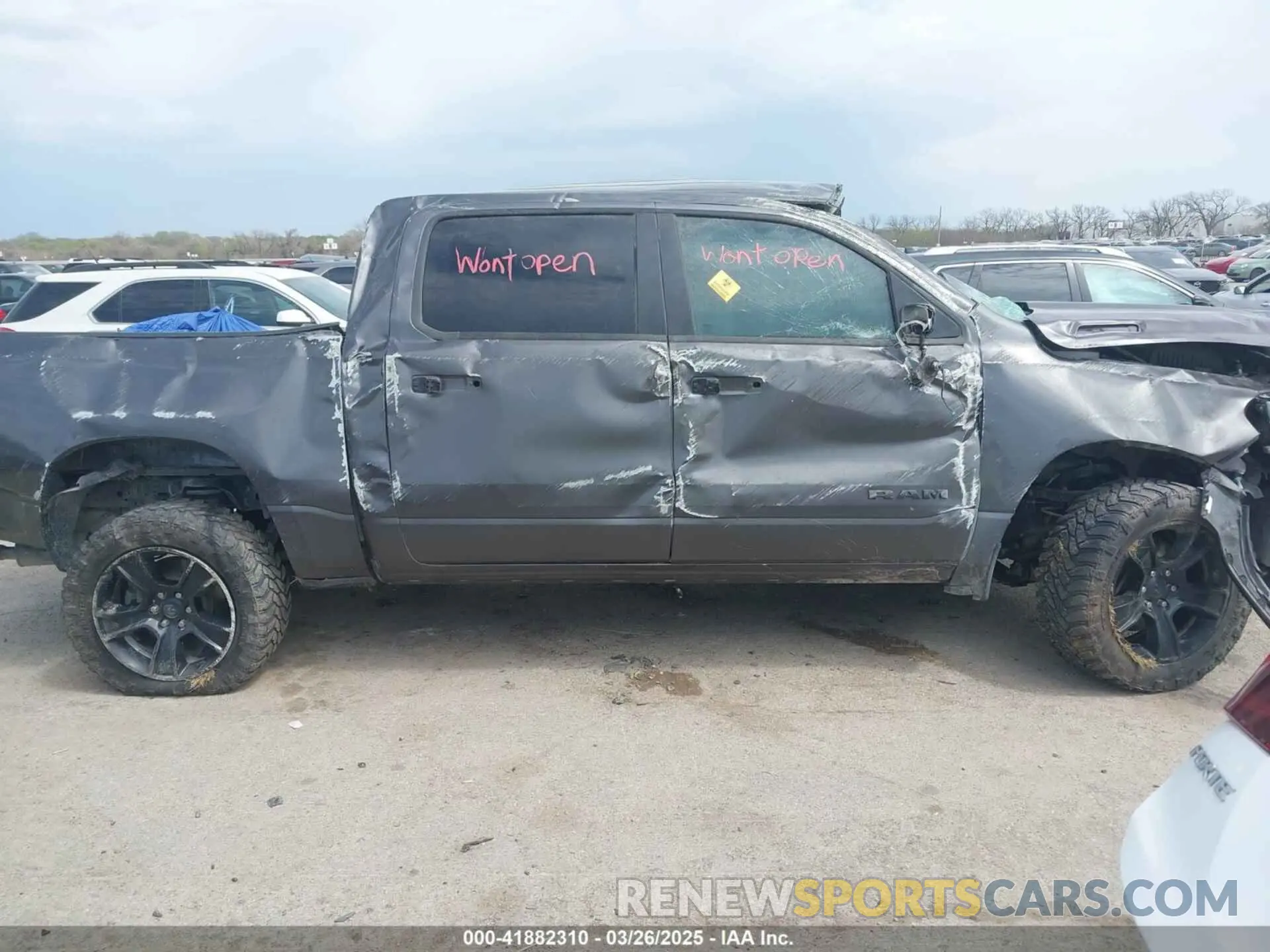 14 Photograph of a damaged car 1C6SRFFT4LN184246 RAM 1500 2020