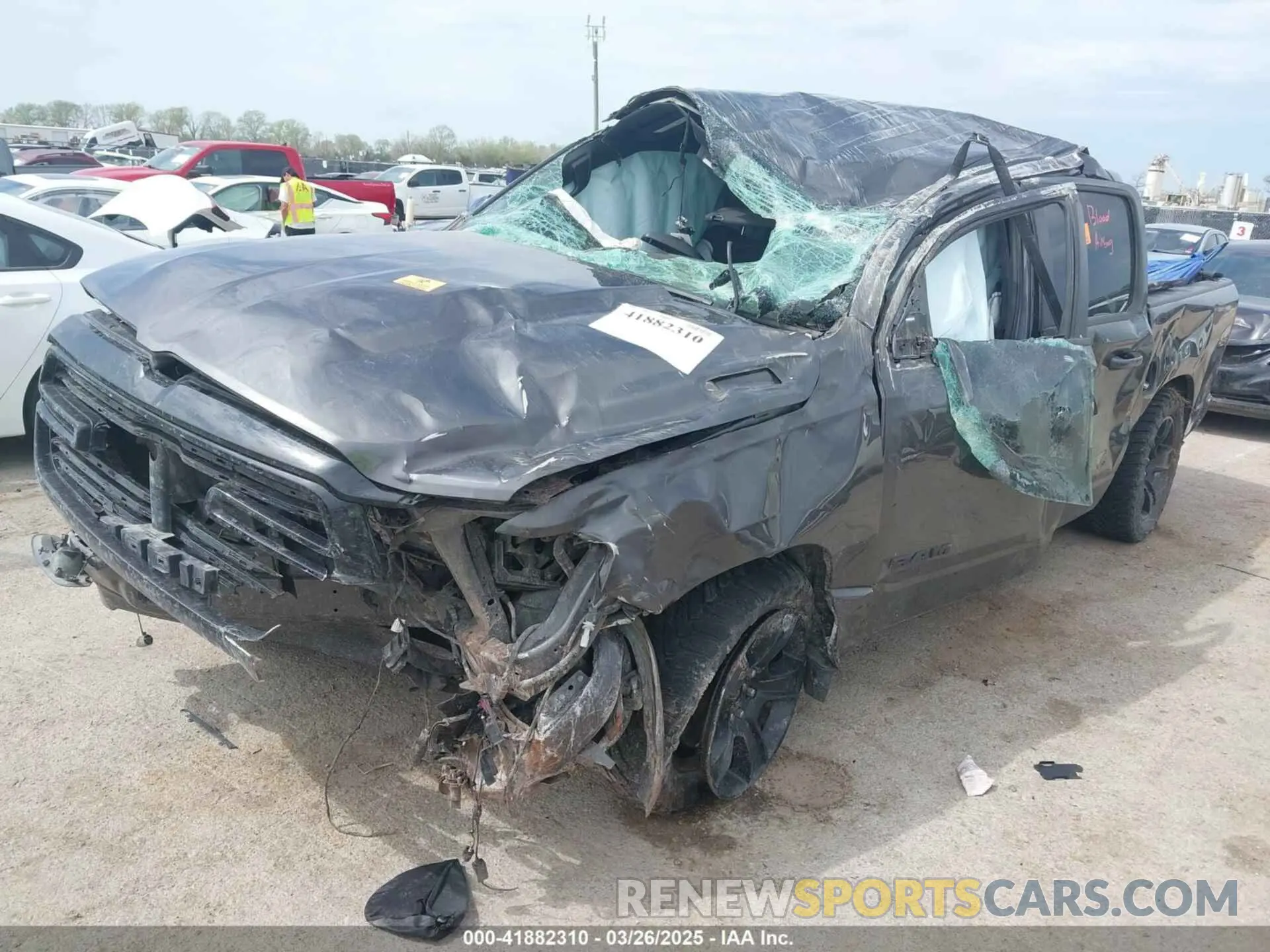 2 Photograph of a damaged car 1C6SRFFT4LN184246 RAM 1500 2020