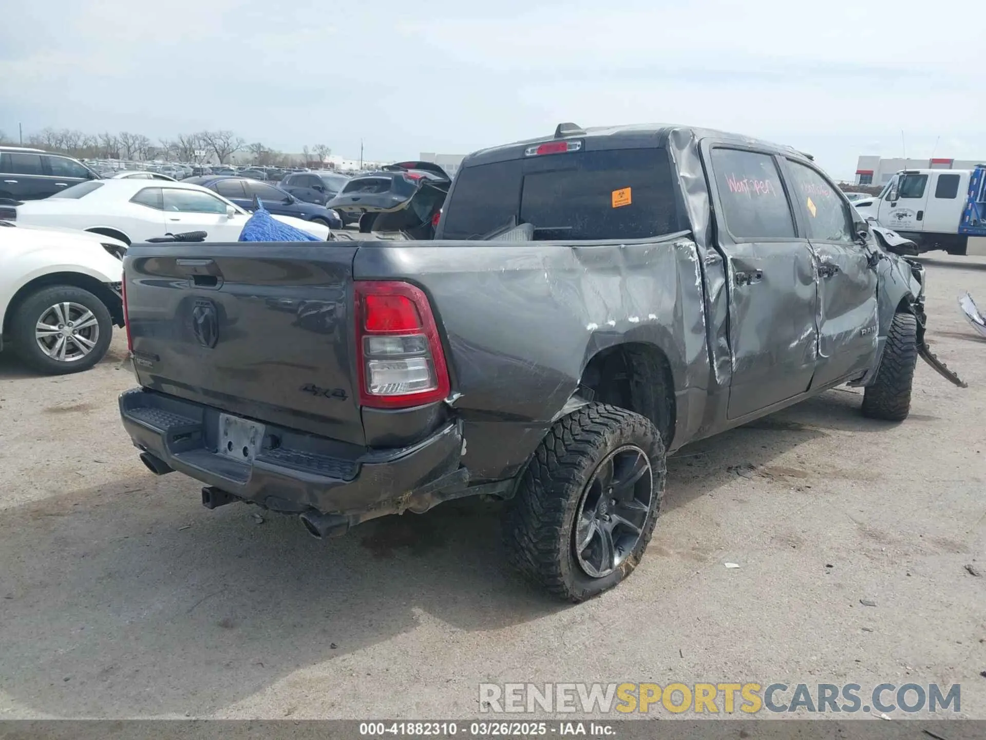 4 Photograph of a damaged car 1C6SRFFT4LN184246 RAM 1500 2020