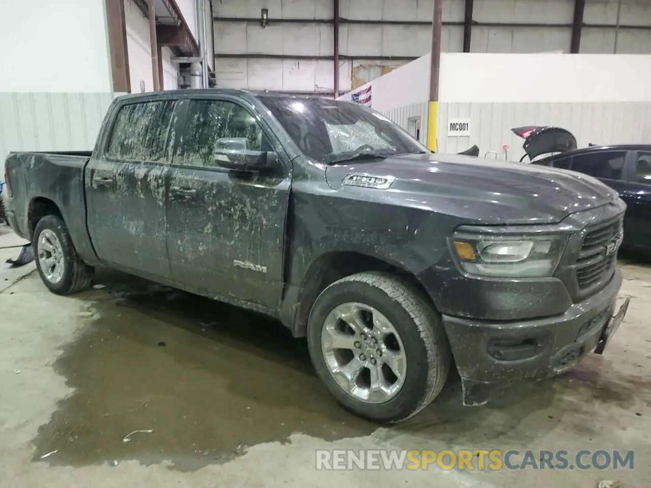 4 Photograph of a damaged car 1C6SRFFT4LN314235 RAM 1500 2020