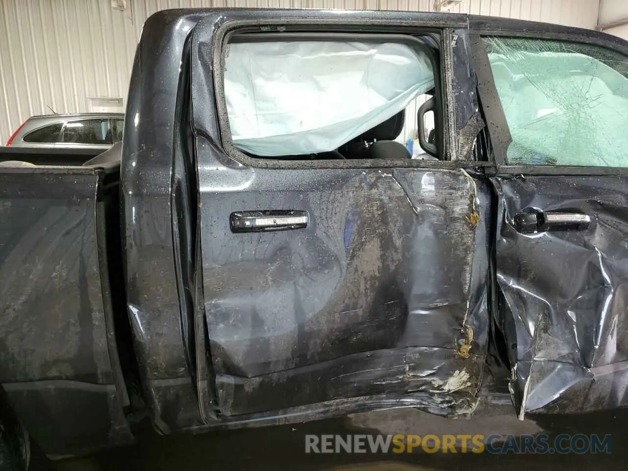 10 Photograph of a damaged car 1C6SRFFT4LN398640 RAM 1500 2020