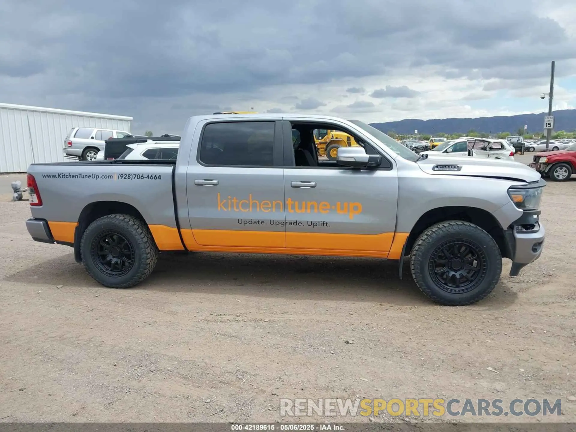 13 Photograph of a damaged car 1C6SRFFT5LN162191 RAM 1500 2020