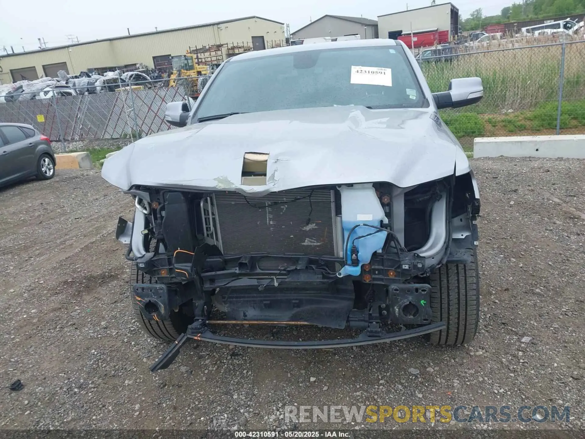 12 Photograph of a damaged car 1C6SRFFT5LN184997 RAM 1500 2020