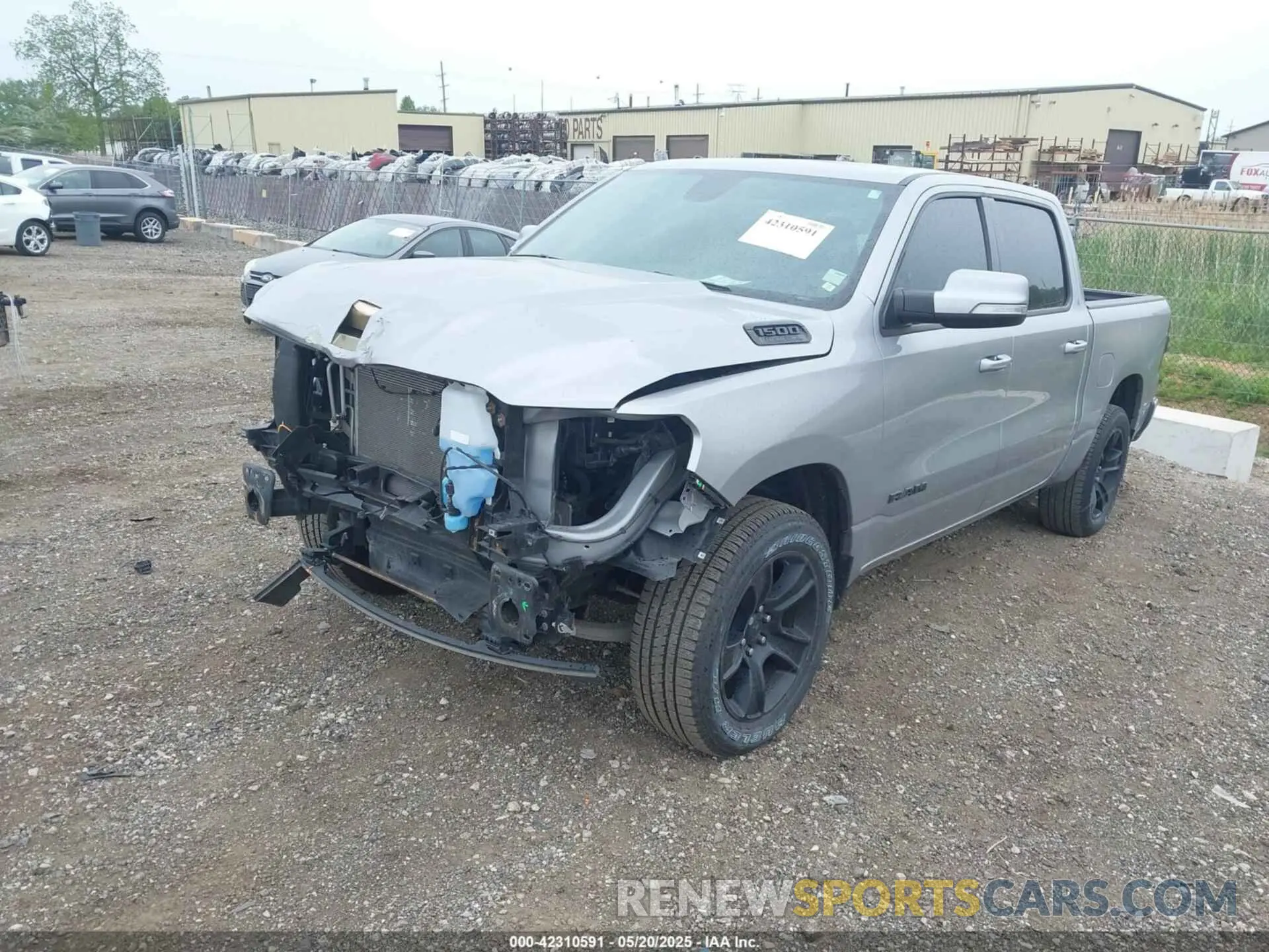 2 Photograph of a damaged car 1C6SRFFT5LN184997 RAM 1500 2020