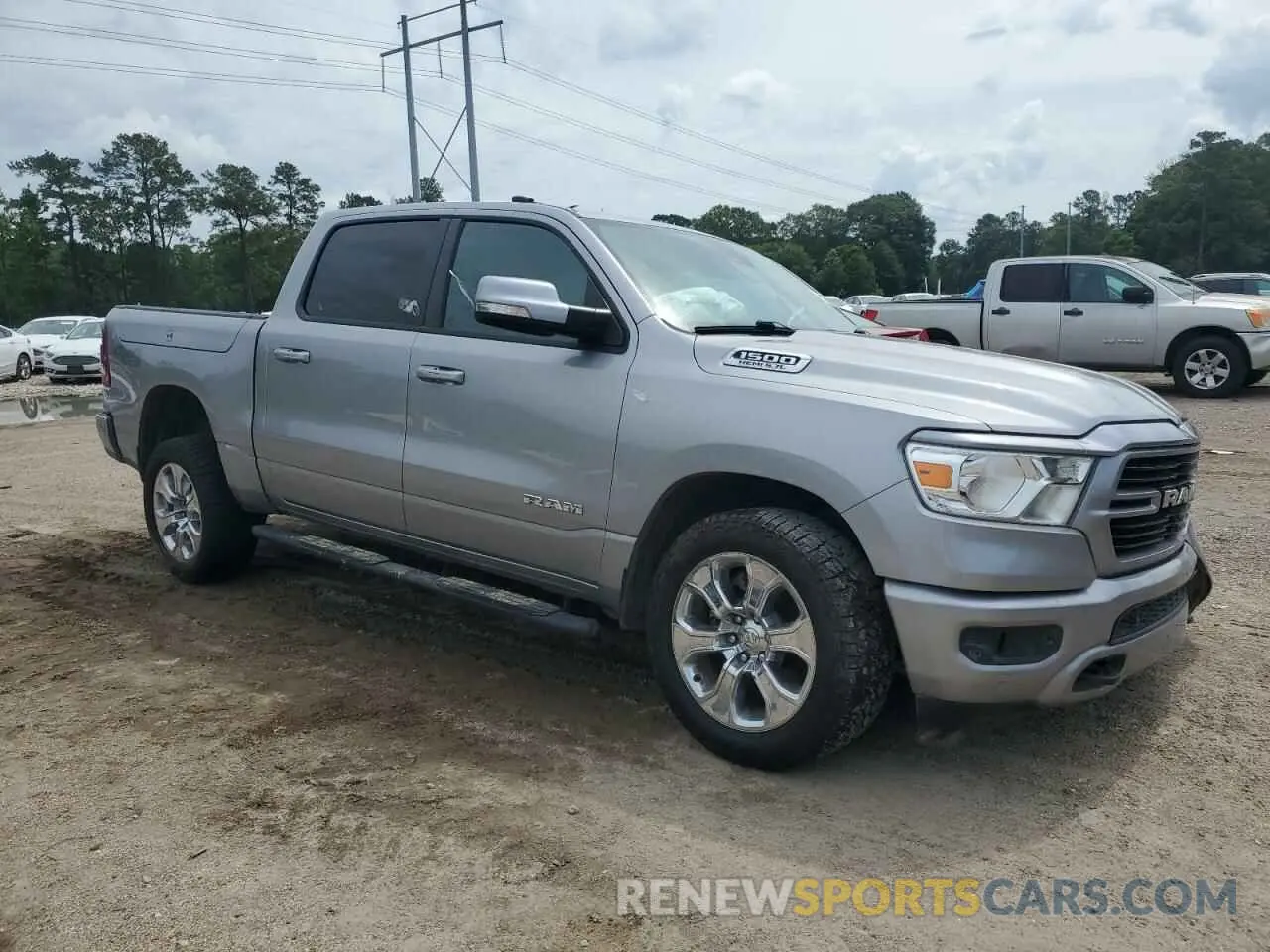 4 Photograph of a damaged car 1C6SRFFT5LN364044 RAM 1500 2020