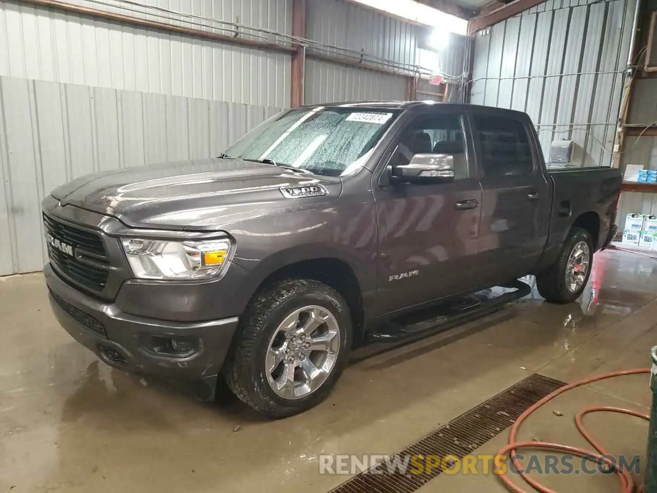 1 Photograph of a damaged car 1C6SRFFT6LN111315 RAM 1500 2020