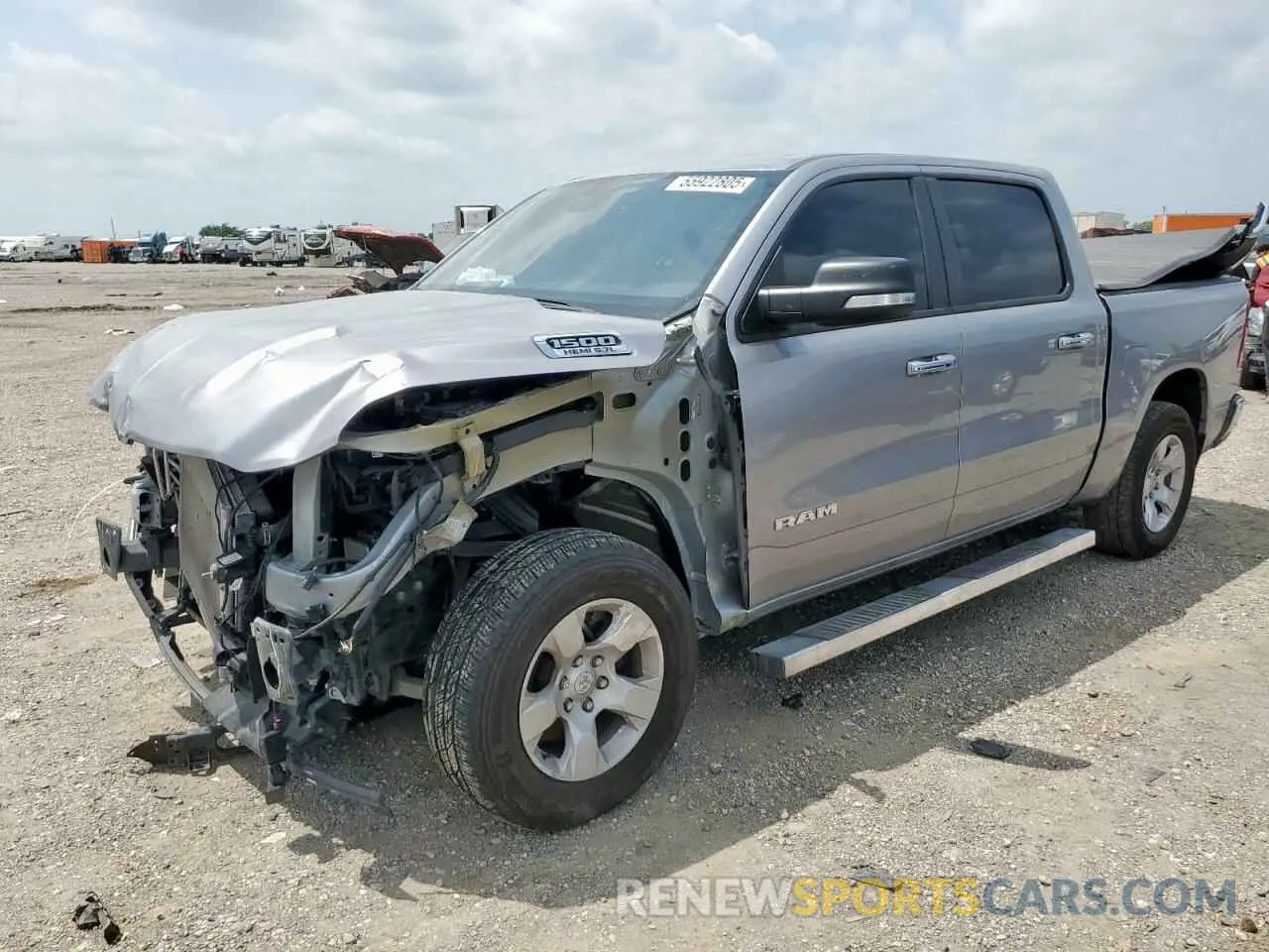 1 Photograph of a damaged car 1C6SRFFT6LN116210 RAM 1500 2020