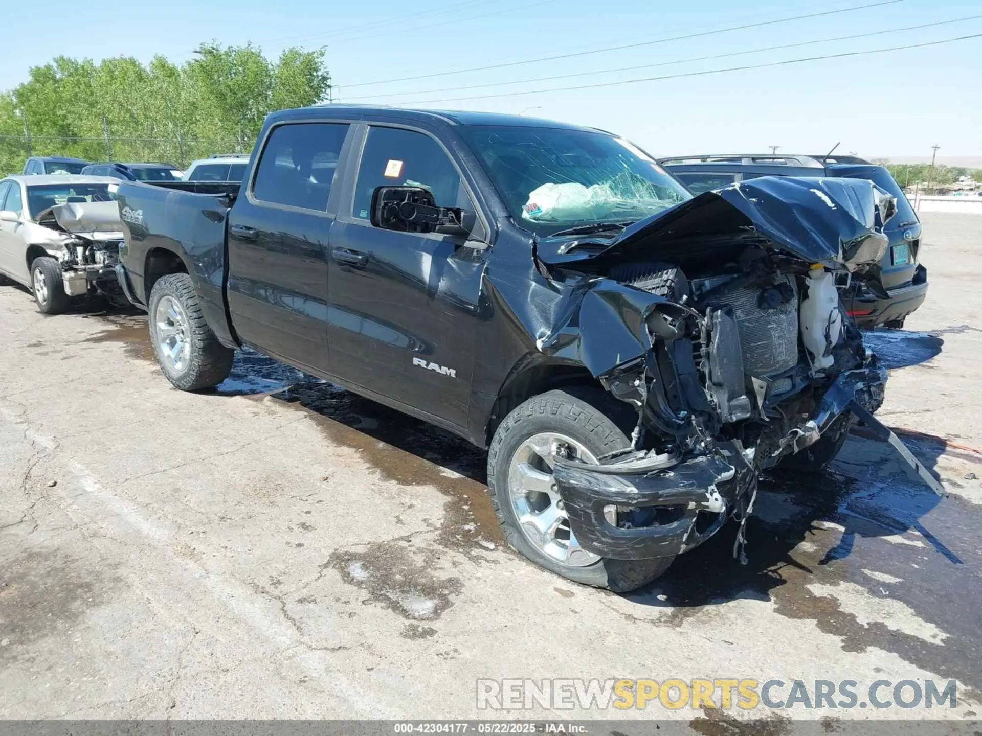 1 Photograph of a damaged car 1C6SRFFT6LN173474 RAM 1500 2020