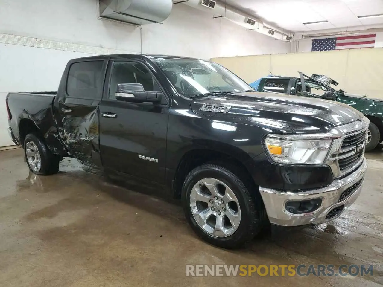 4 Photograph of a damaged car 1C6SRFFT6LN327102 RAM 1500 2020