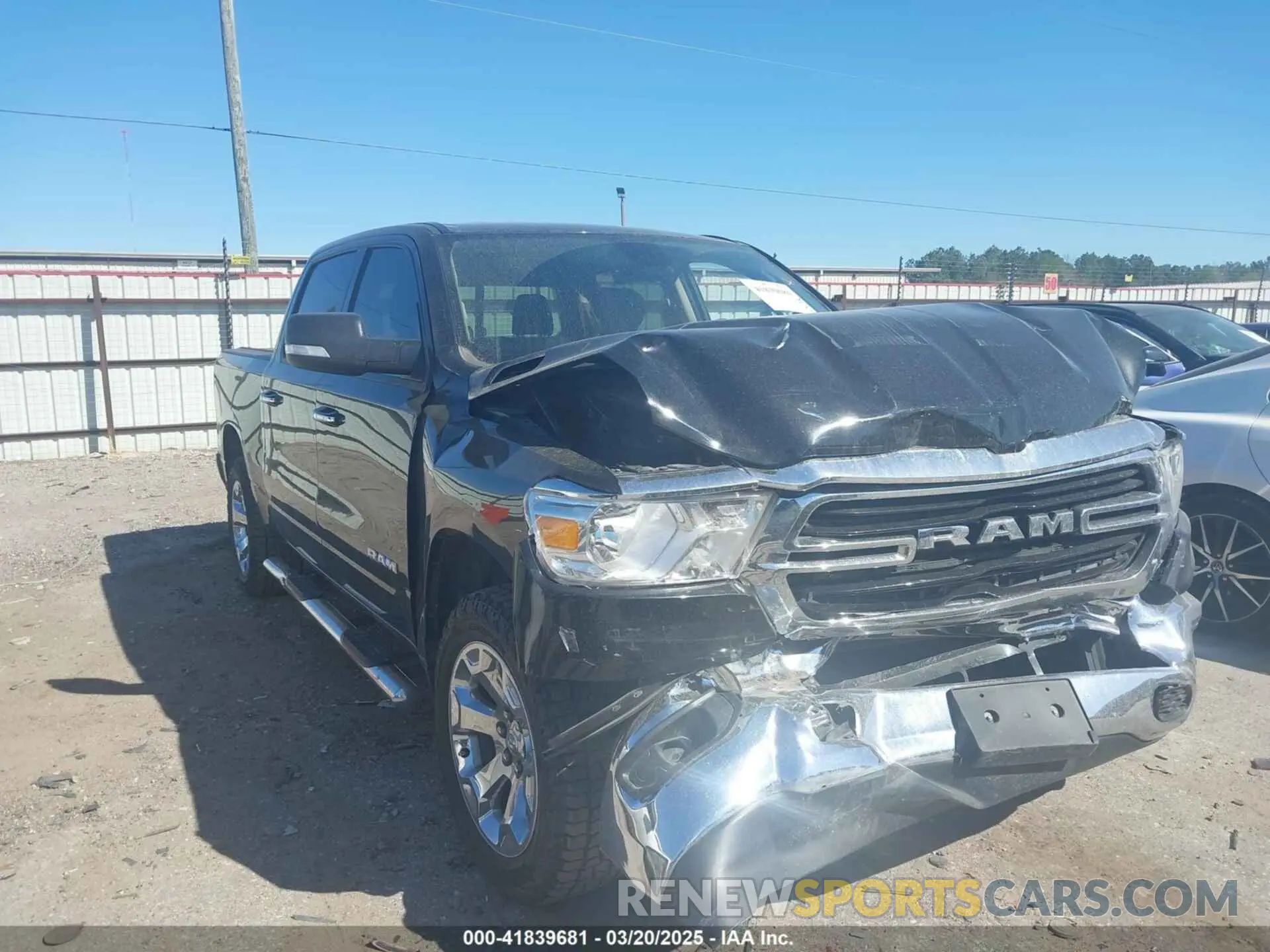 1 Photograph of a damaged car 1C6SRFFT7LN137051 RAM 1500 2020