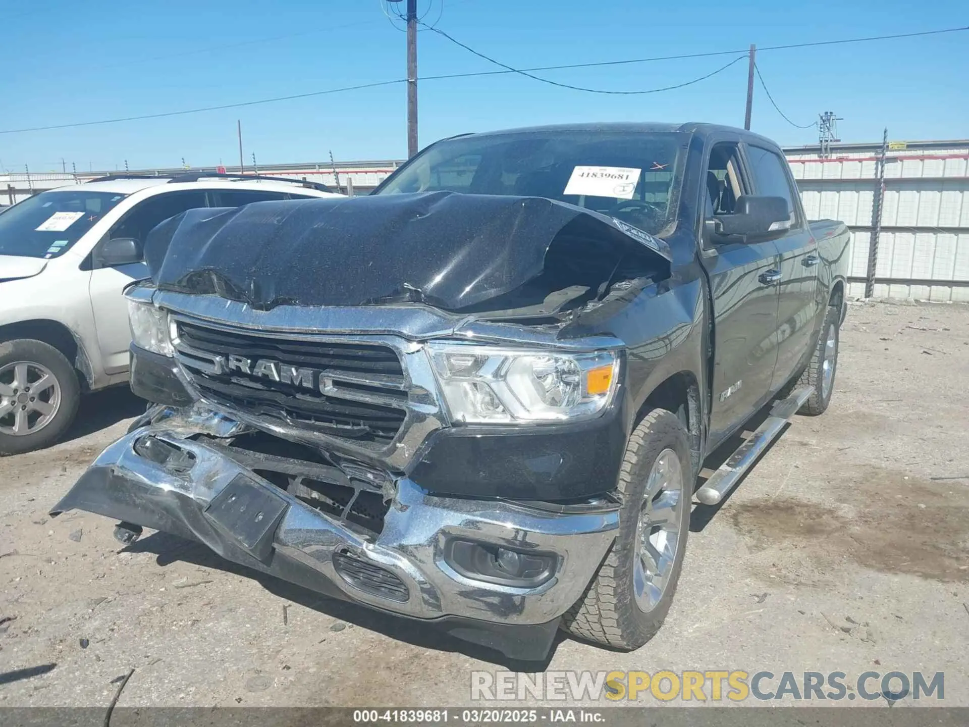 2 Photograph of a damaged car 1C6SRFFT7LN137051 RAM 1500 2020
