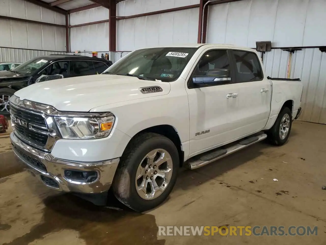1 Photograph of a damaged car 1C6SRFFT7LN318490 RAM 1500 2020