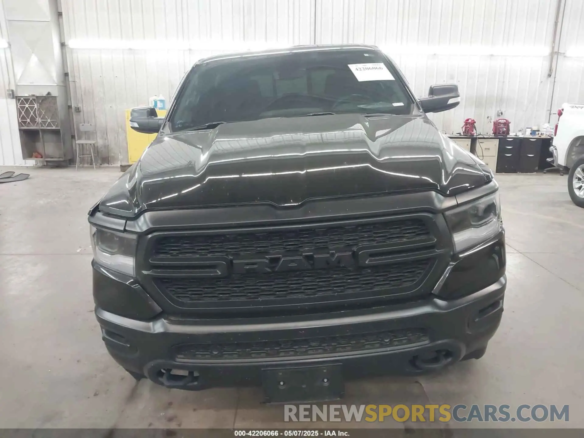 13 Photograph of a damaged car 1C6SRFFT8LN308129 RAM 1500 2020