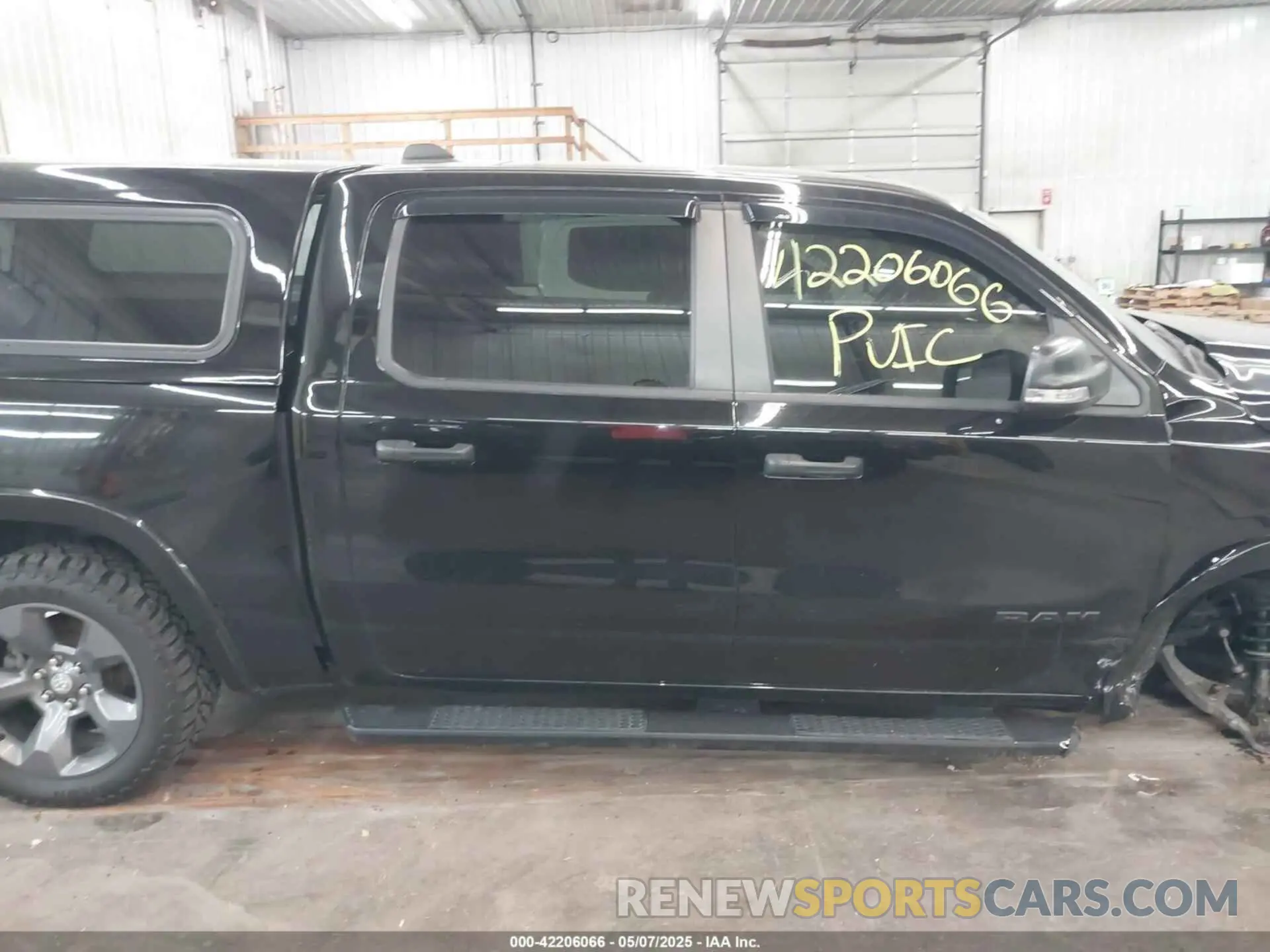 14 Photograph of a damaged car 1C6SRFFT8LN308129 RAM 1500 2020