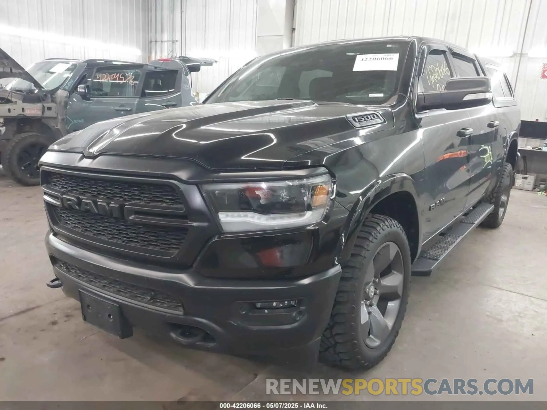 2 Photograph of a damaged car 1C6SRFFT8LN308129 RAM 1500 2020